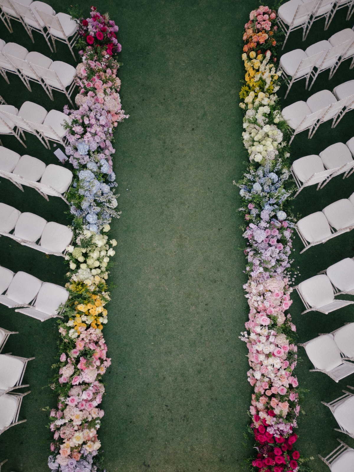 rainbow wedding ceremony florals