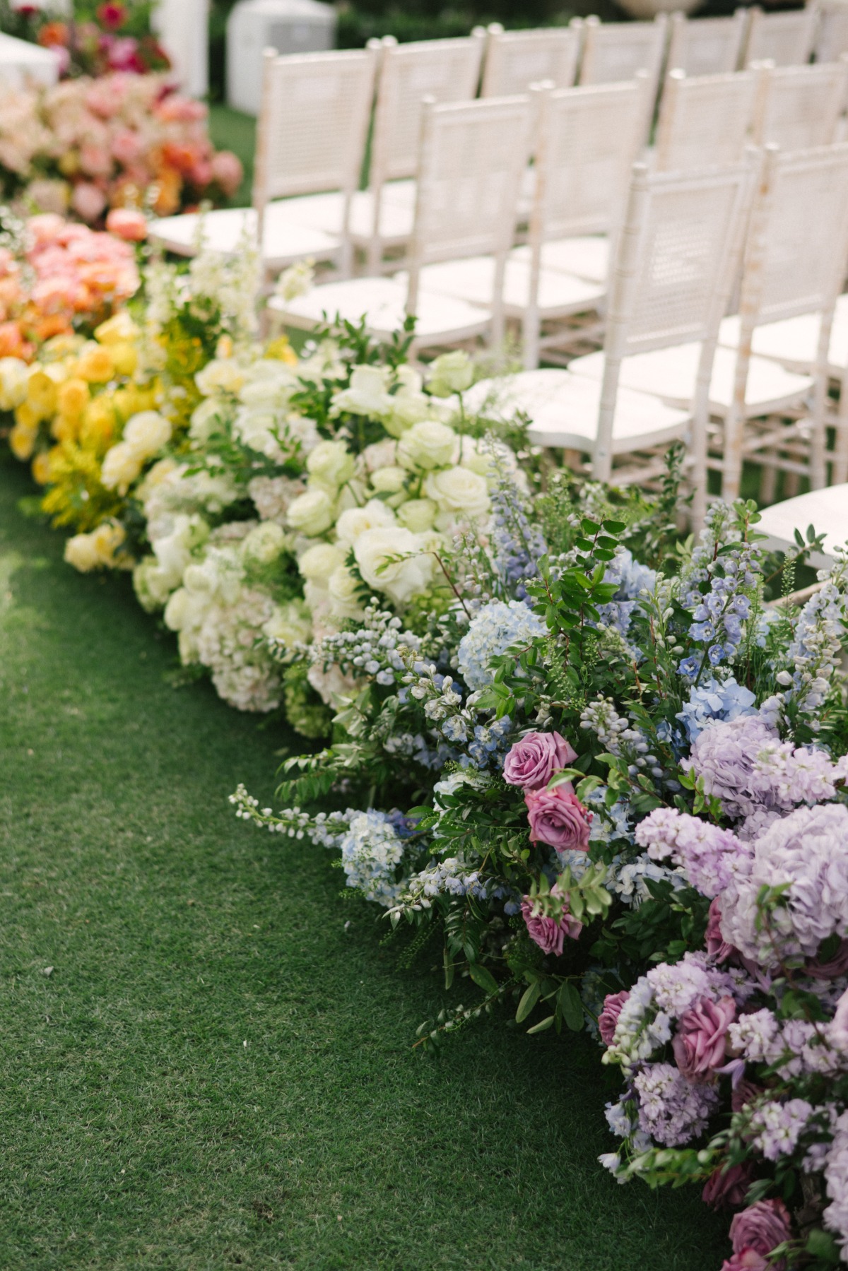 multicolored rainbow wedding florals