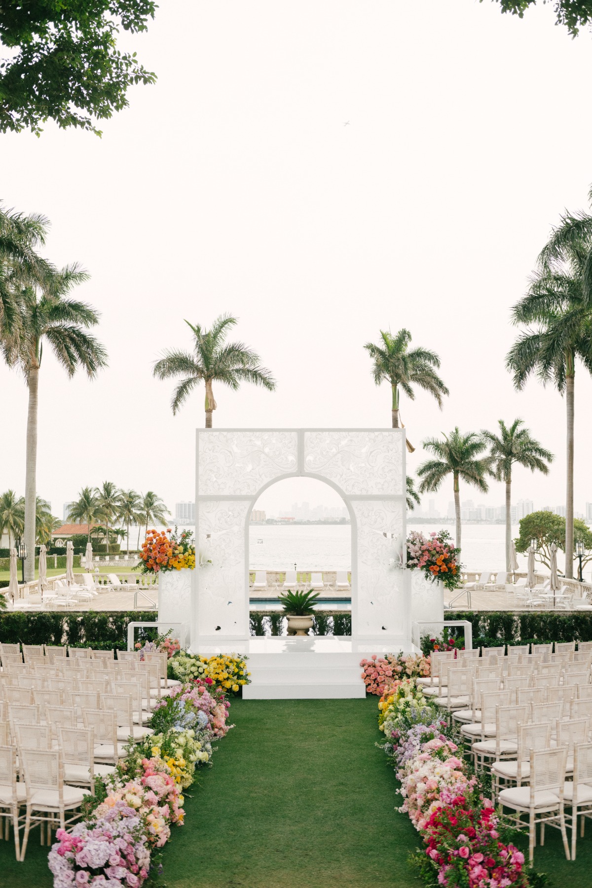 white lace inspired arch for wedding ceremony rental miami