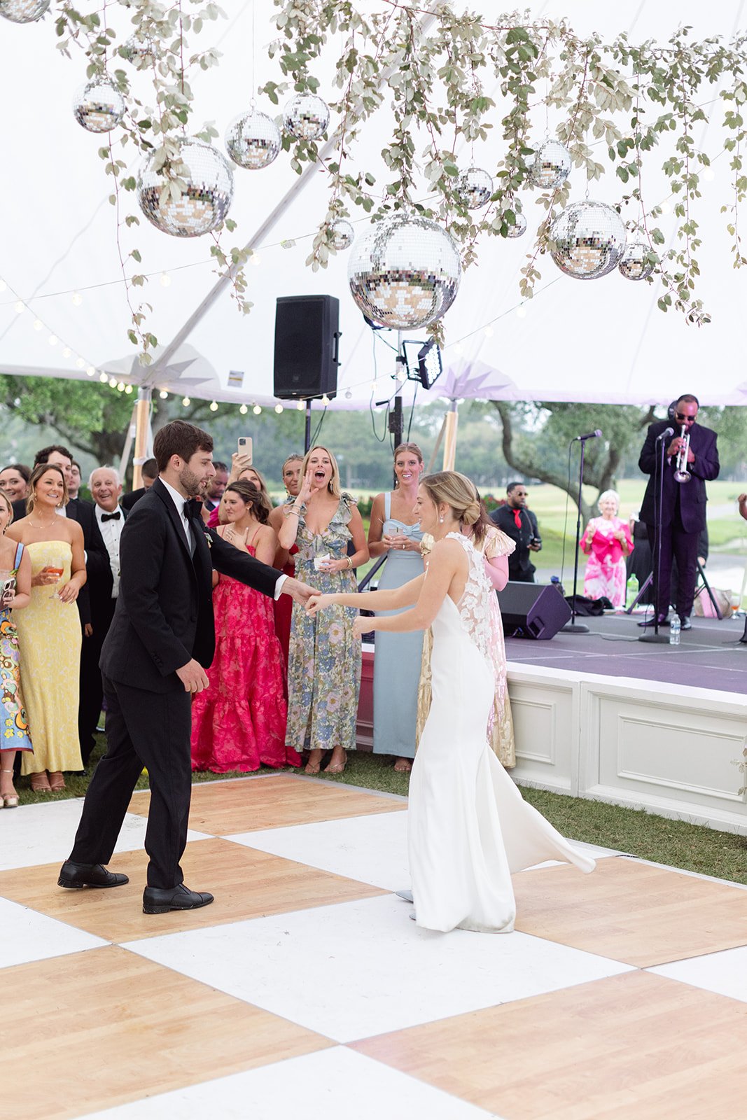 tented wedding reception with disco balls