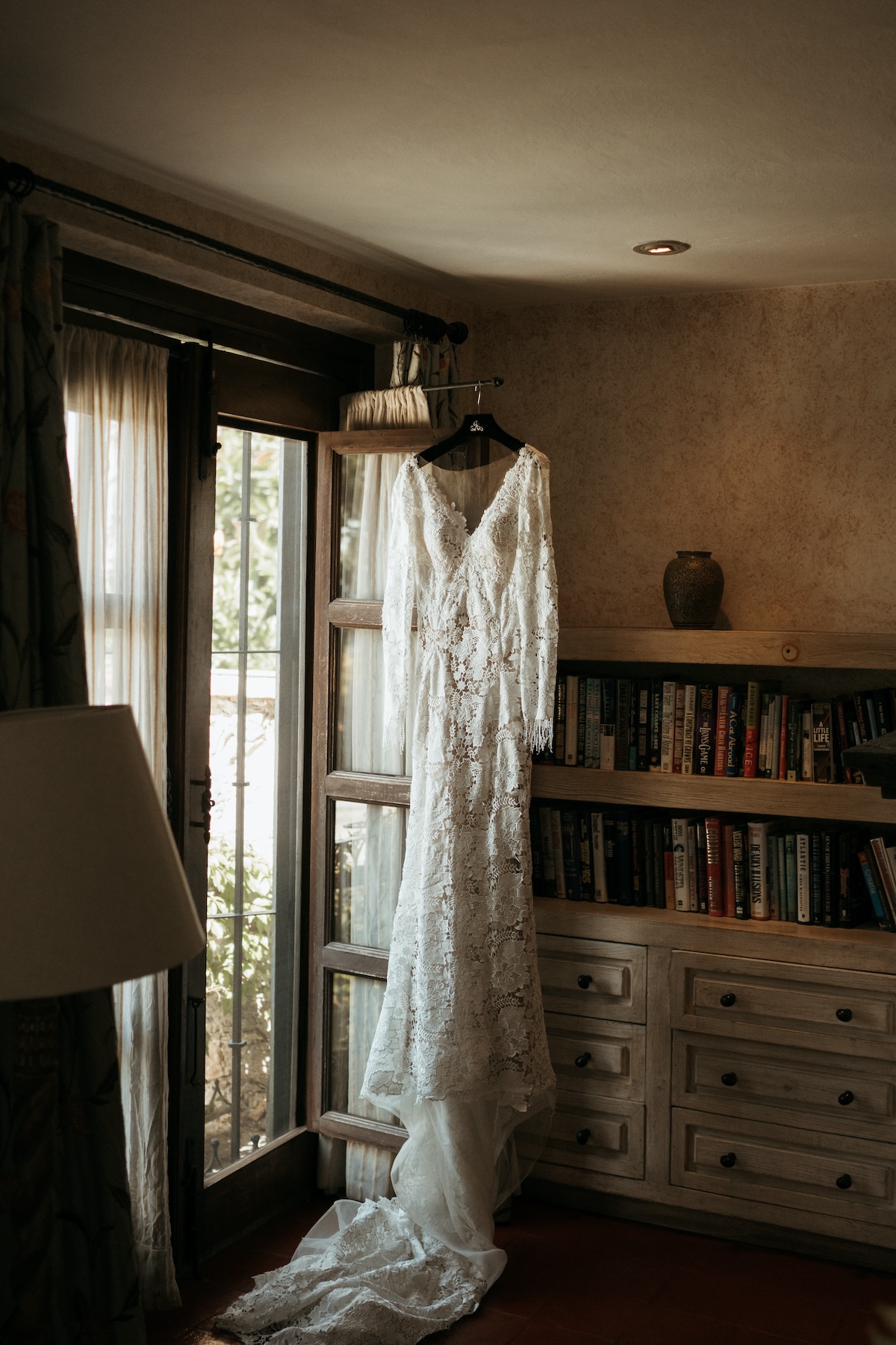 long sleeve lace wedding gown in vintage hotel