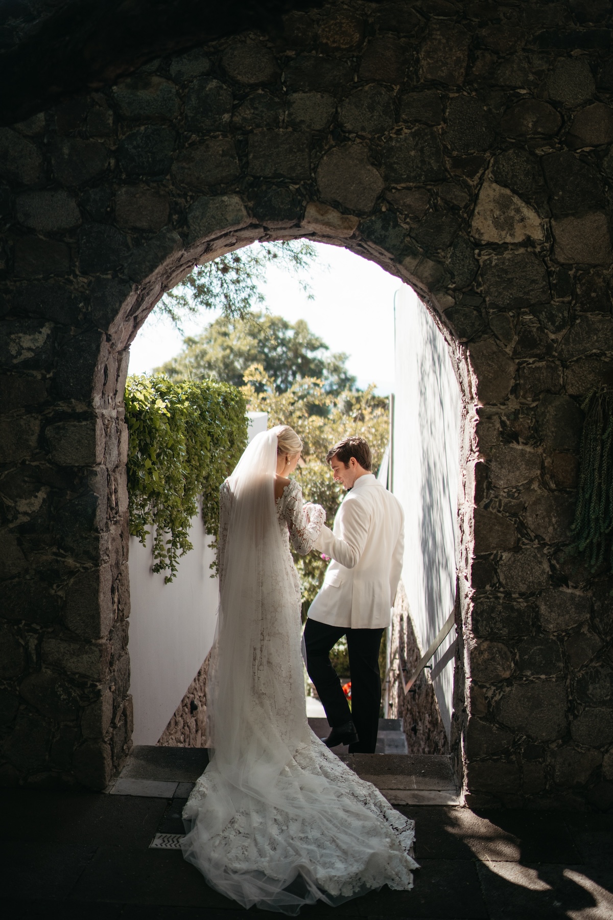 moody wedding photography inspiration in arched doorway