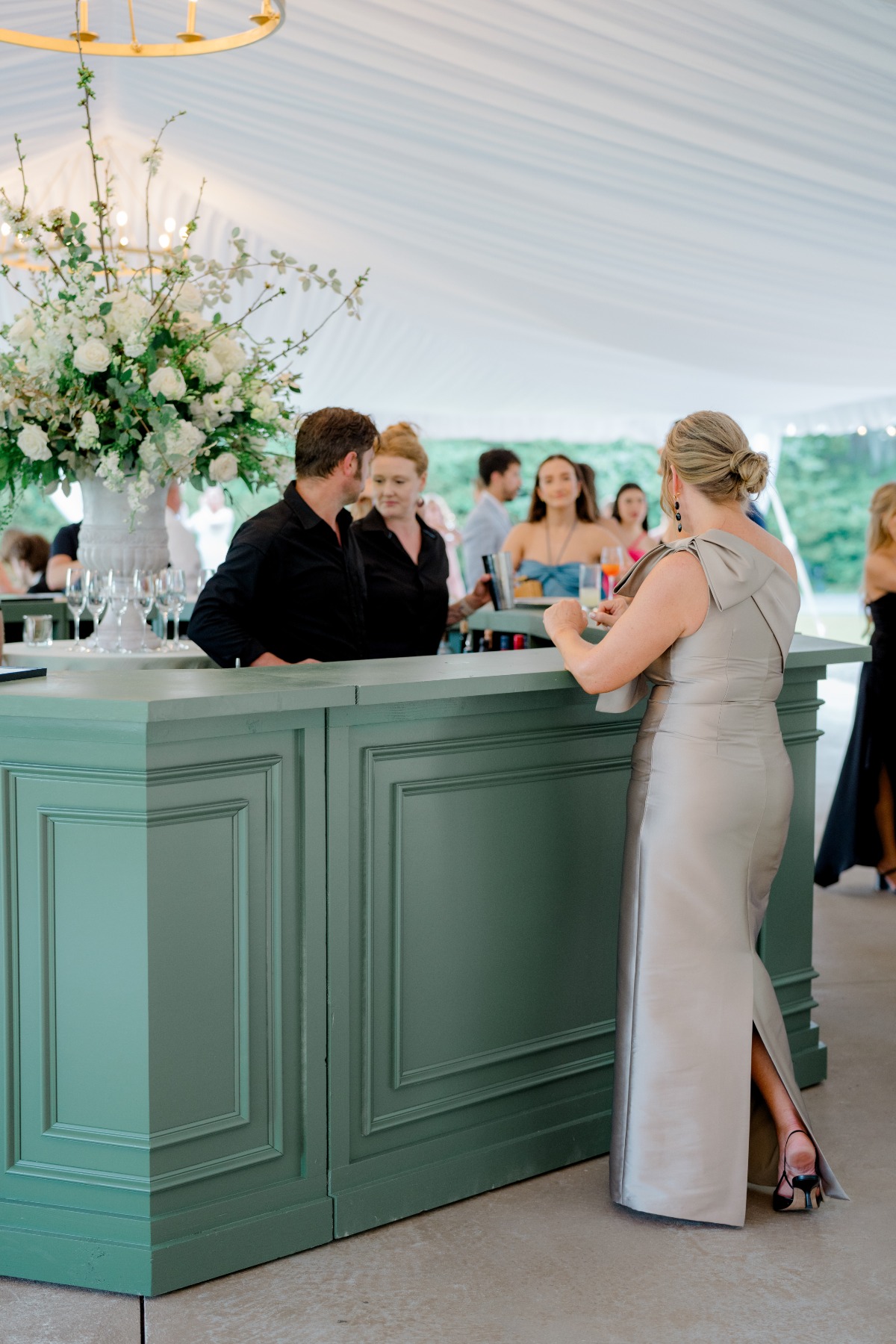 tented wedding reception with bar