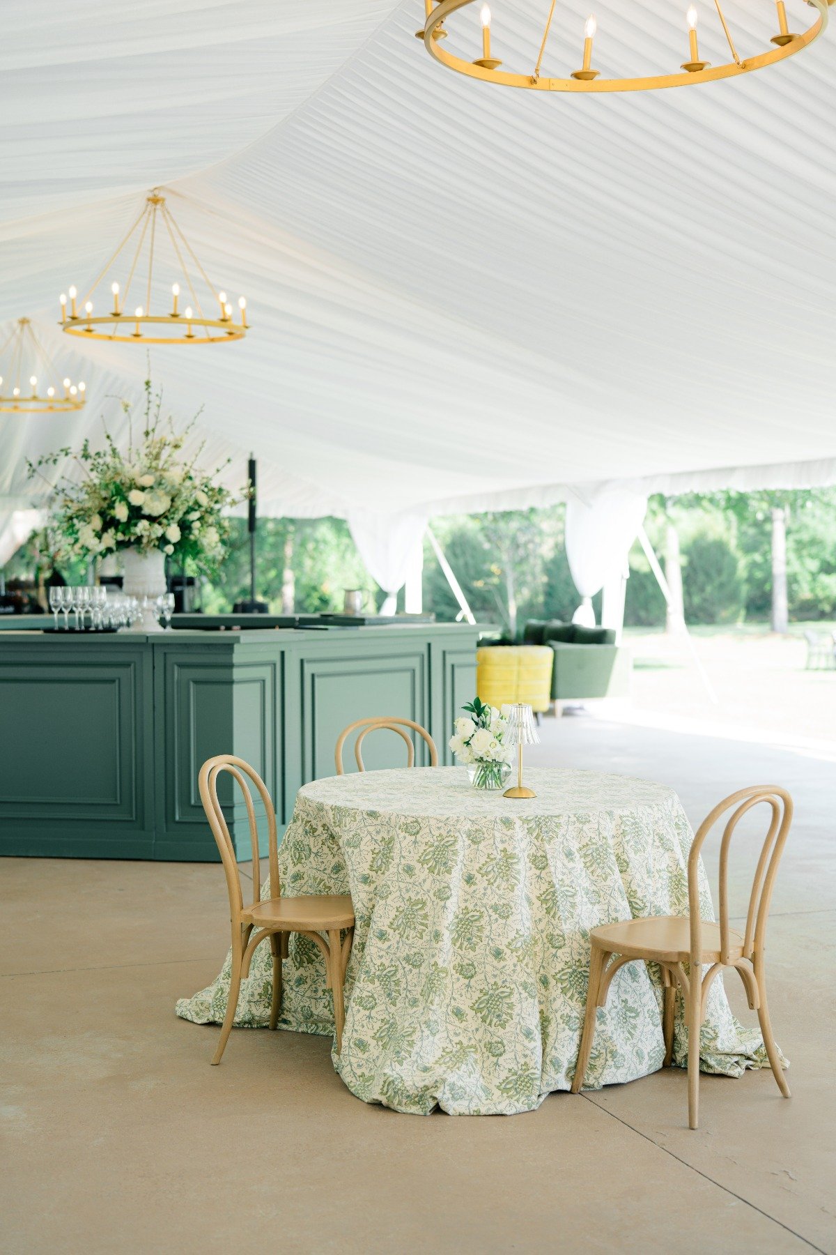 white and green wedding reception with custom bar