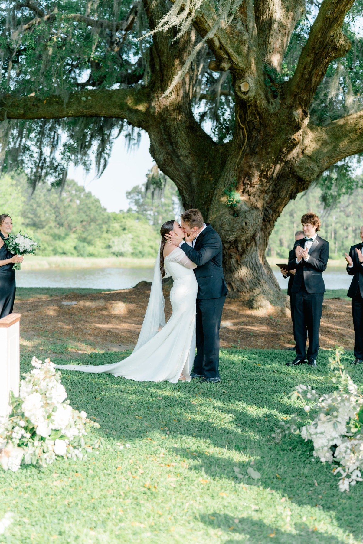 outdoor wedding ceremony under a big oak tree