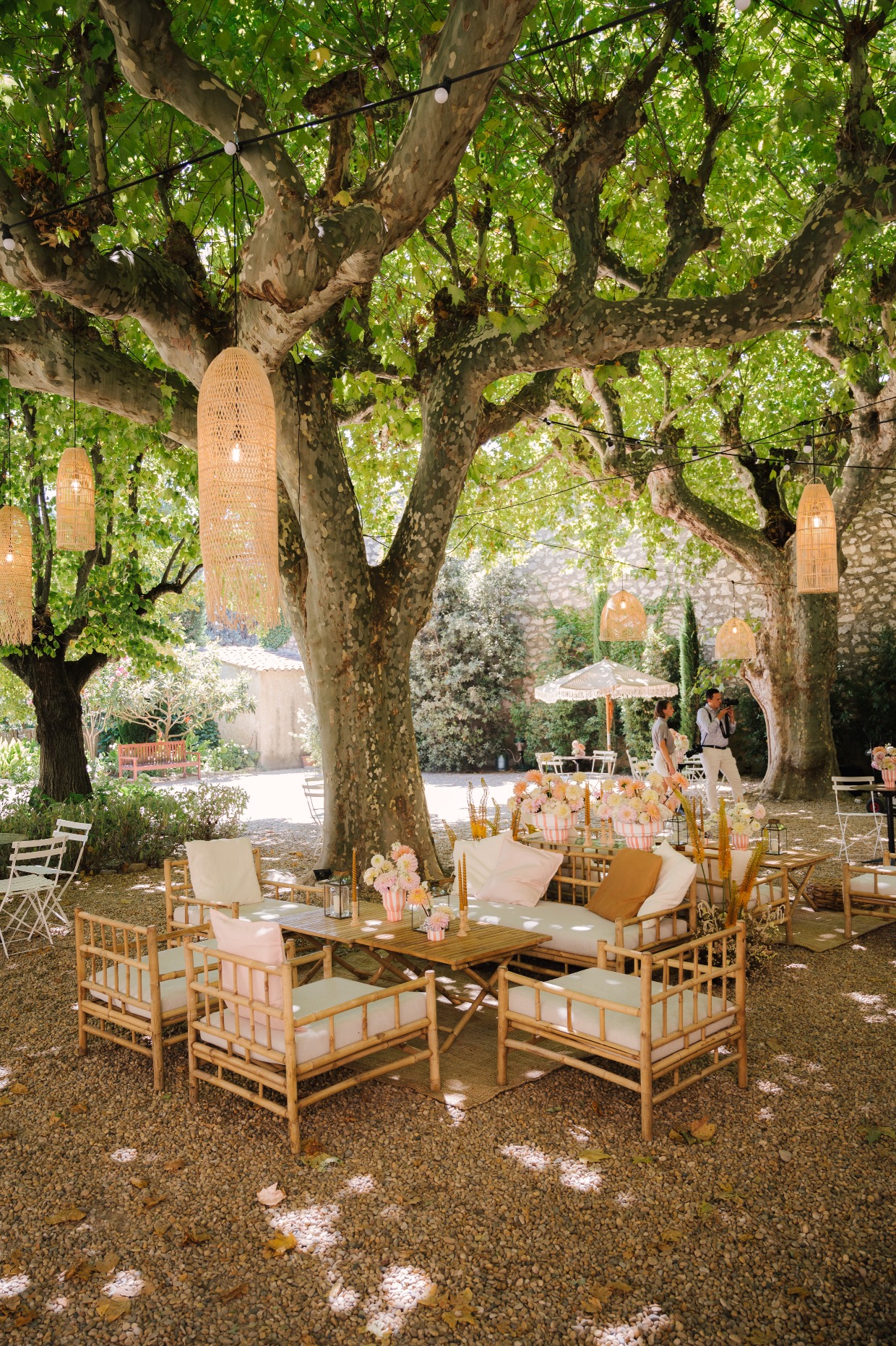 outdoor lounge set up for wedding with chandeliers from belounge