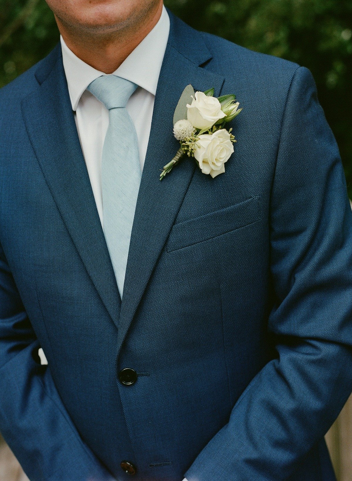 blue suit for groom with light blue tie