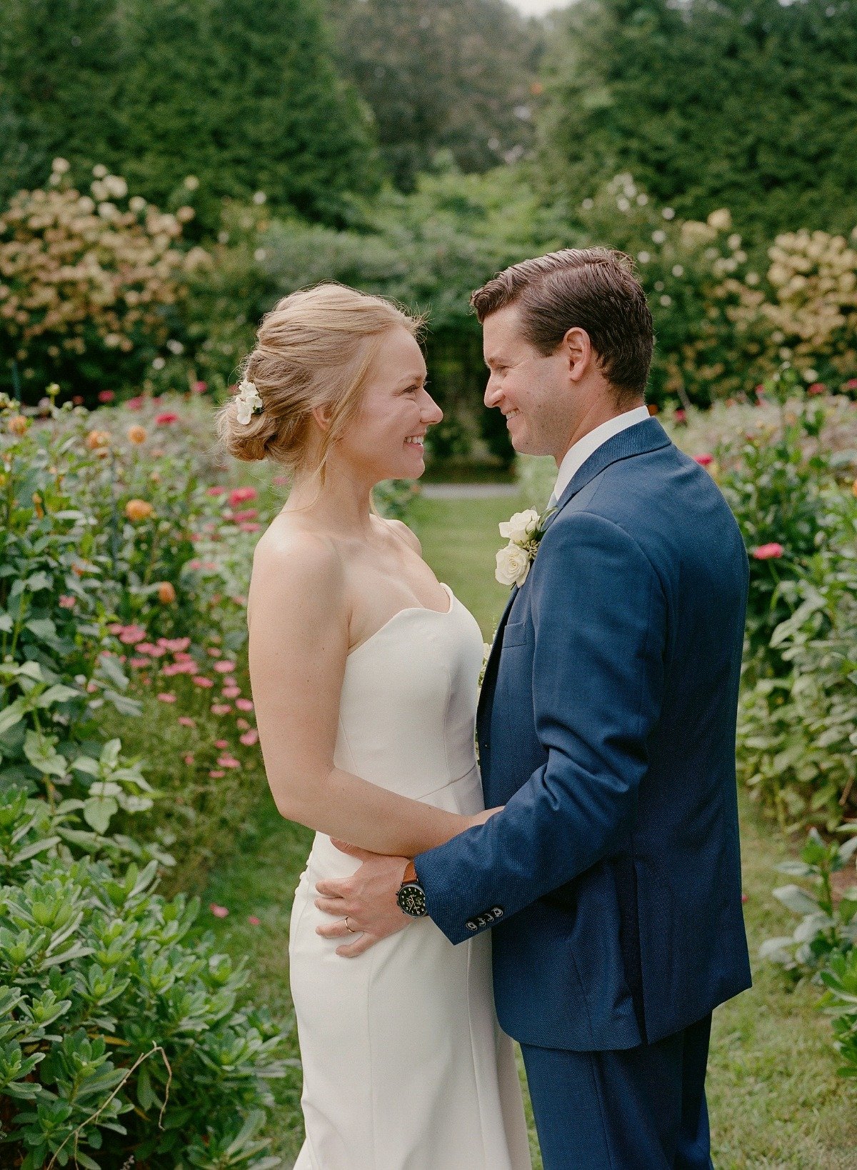 couple in a field of wildflowers for their wedding