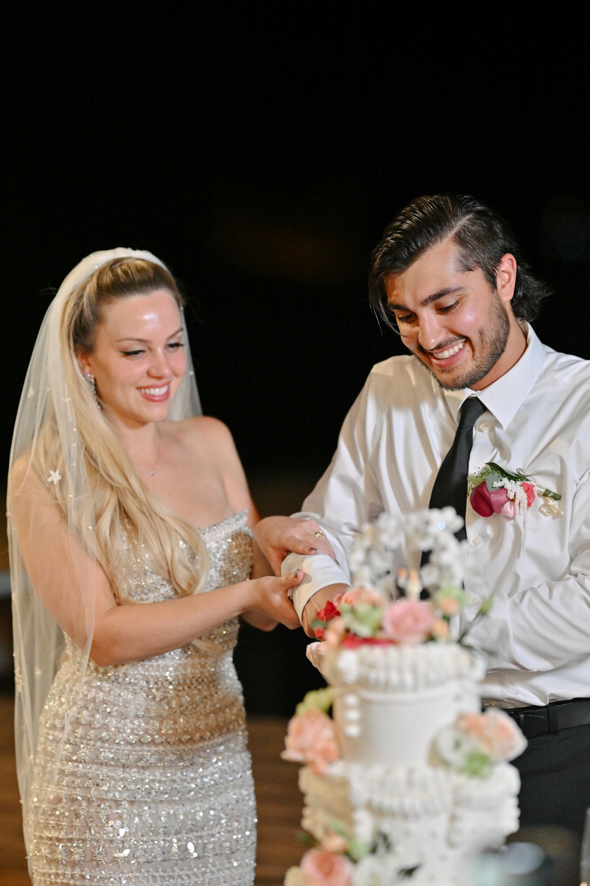 couple cutting cake