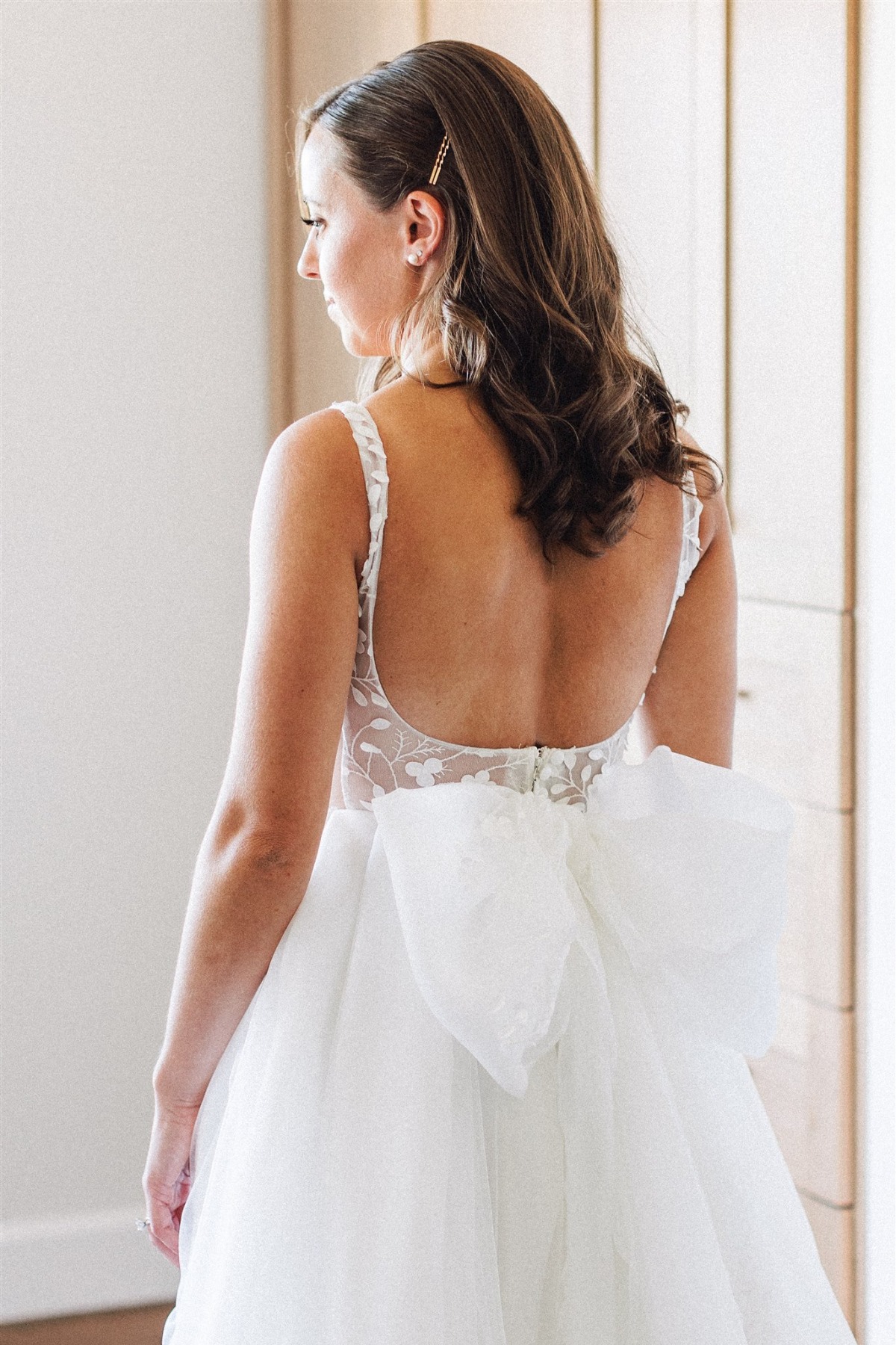 wedding gown with big bow in the back