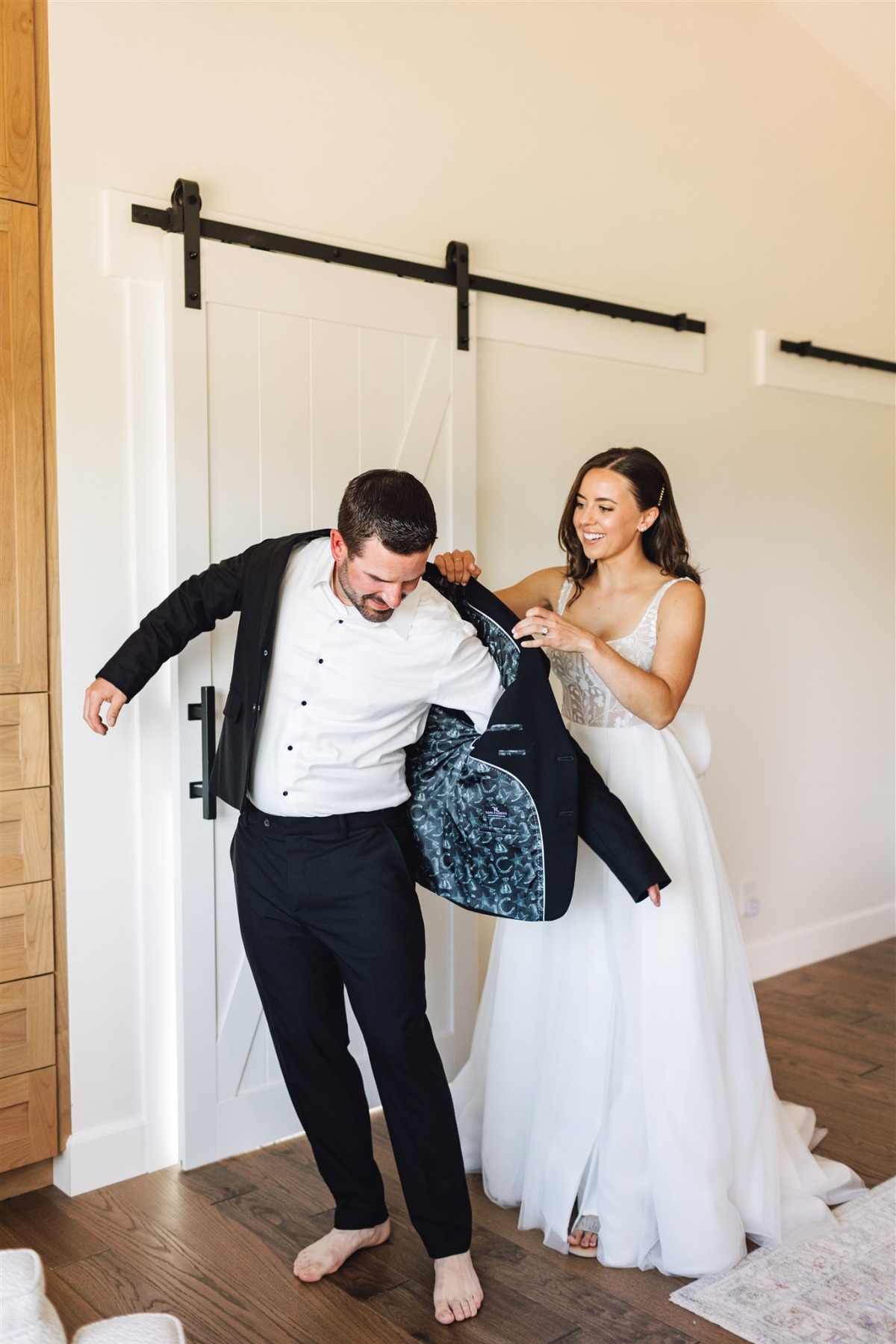 bride and groom getting ready together