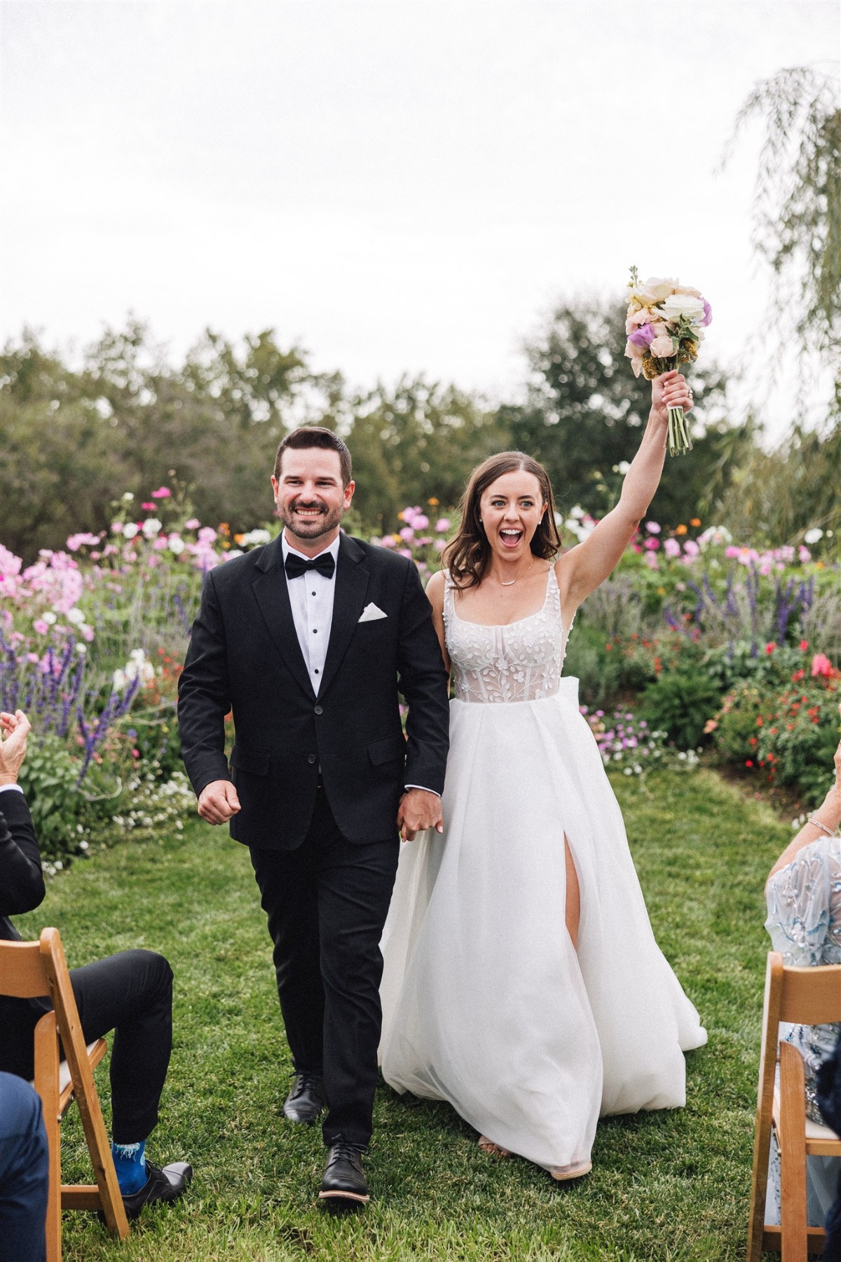 bride and groom at wildflower backyard wedding