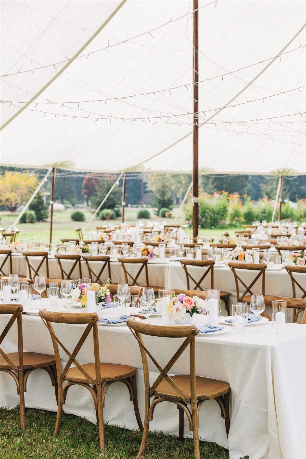 large tented reception with pastel colors