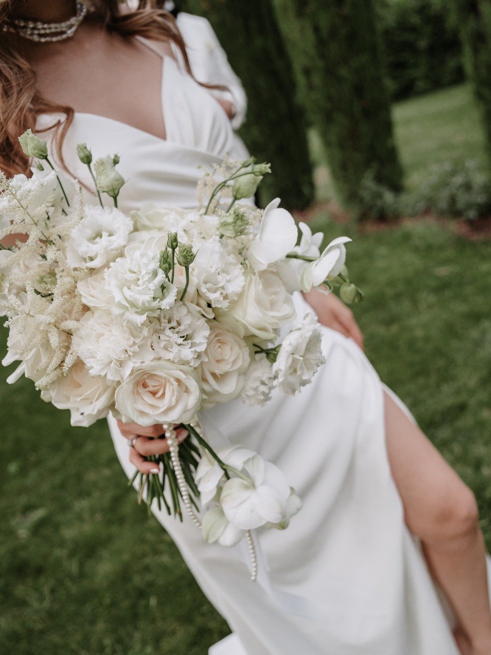 all white wedding bouquet with pearls