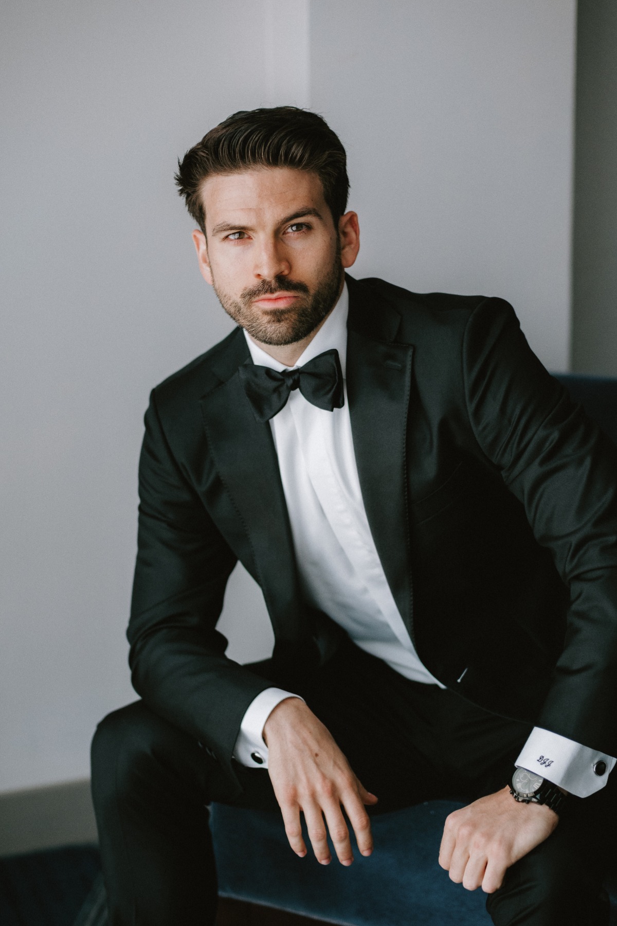 groom in classic black tuxedo