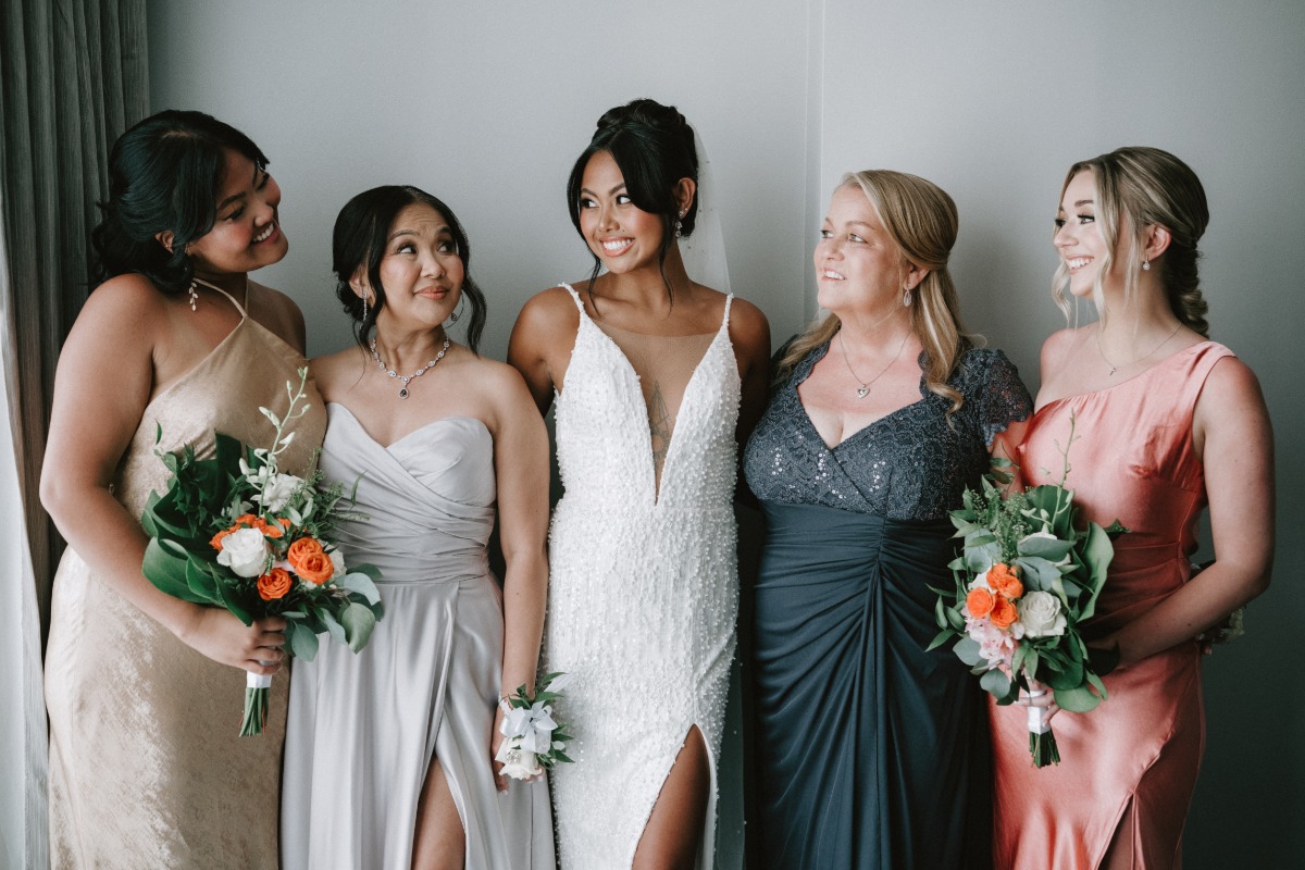 bride with bridesmaids at tropical wedding