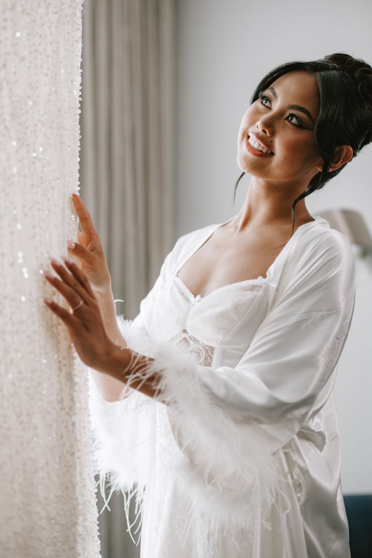 bride getting ready with sequin wedding dress