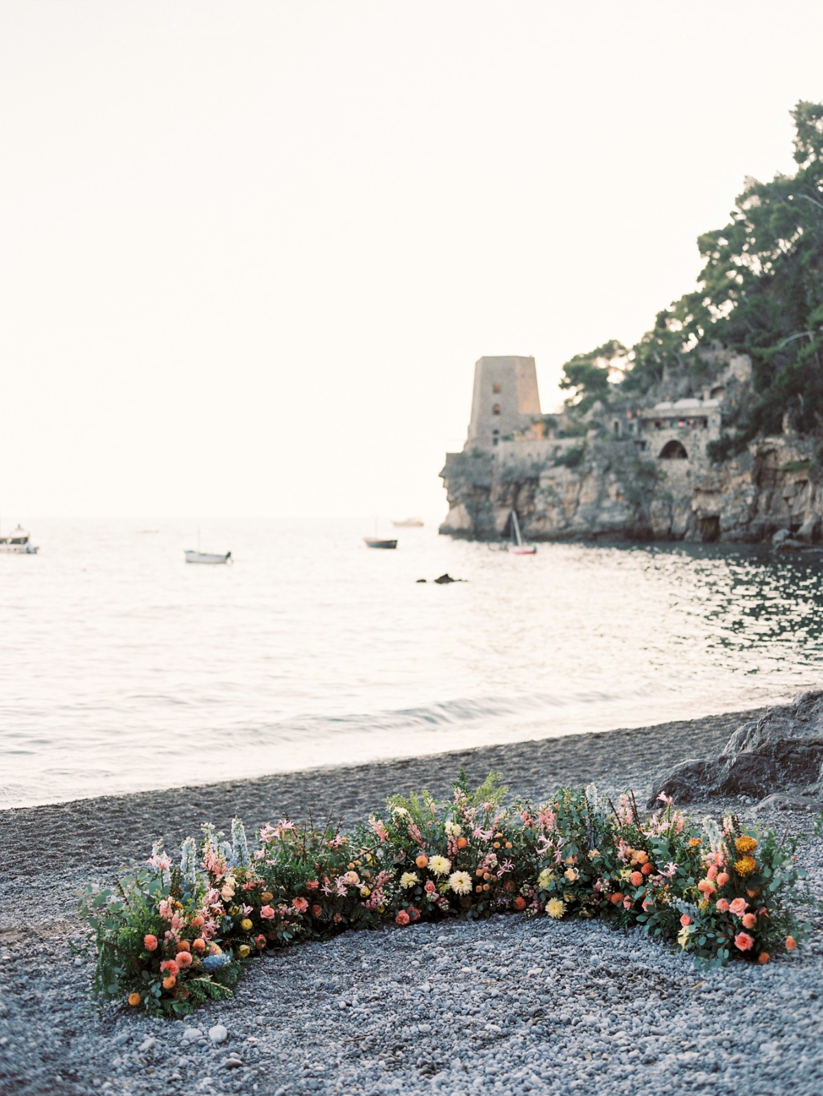 floor floral arrangement at seaside wedding ceremony in positano