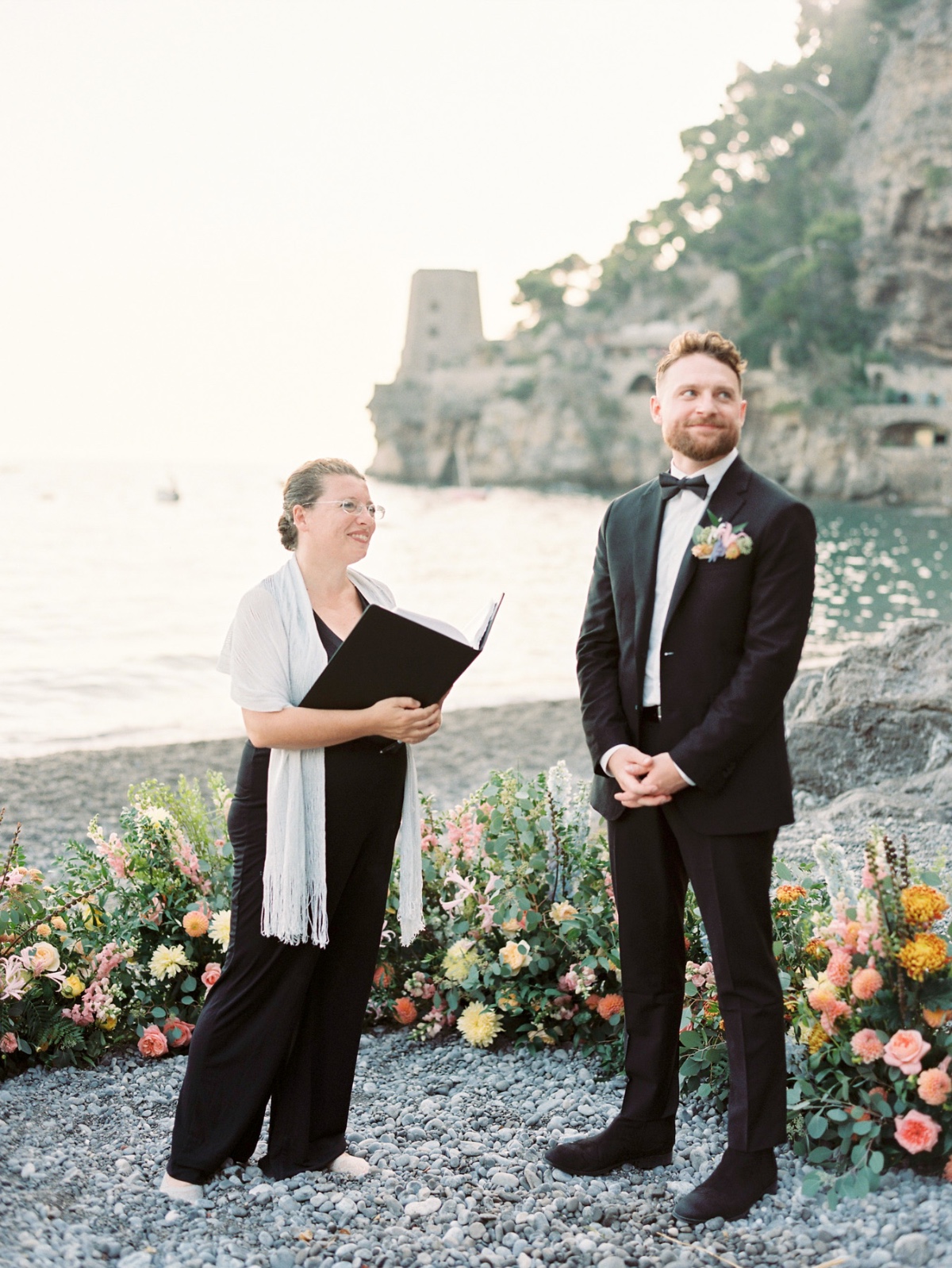 groom waiting for bride at seaside elopement ceremony