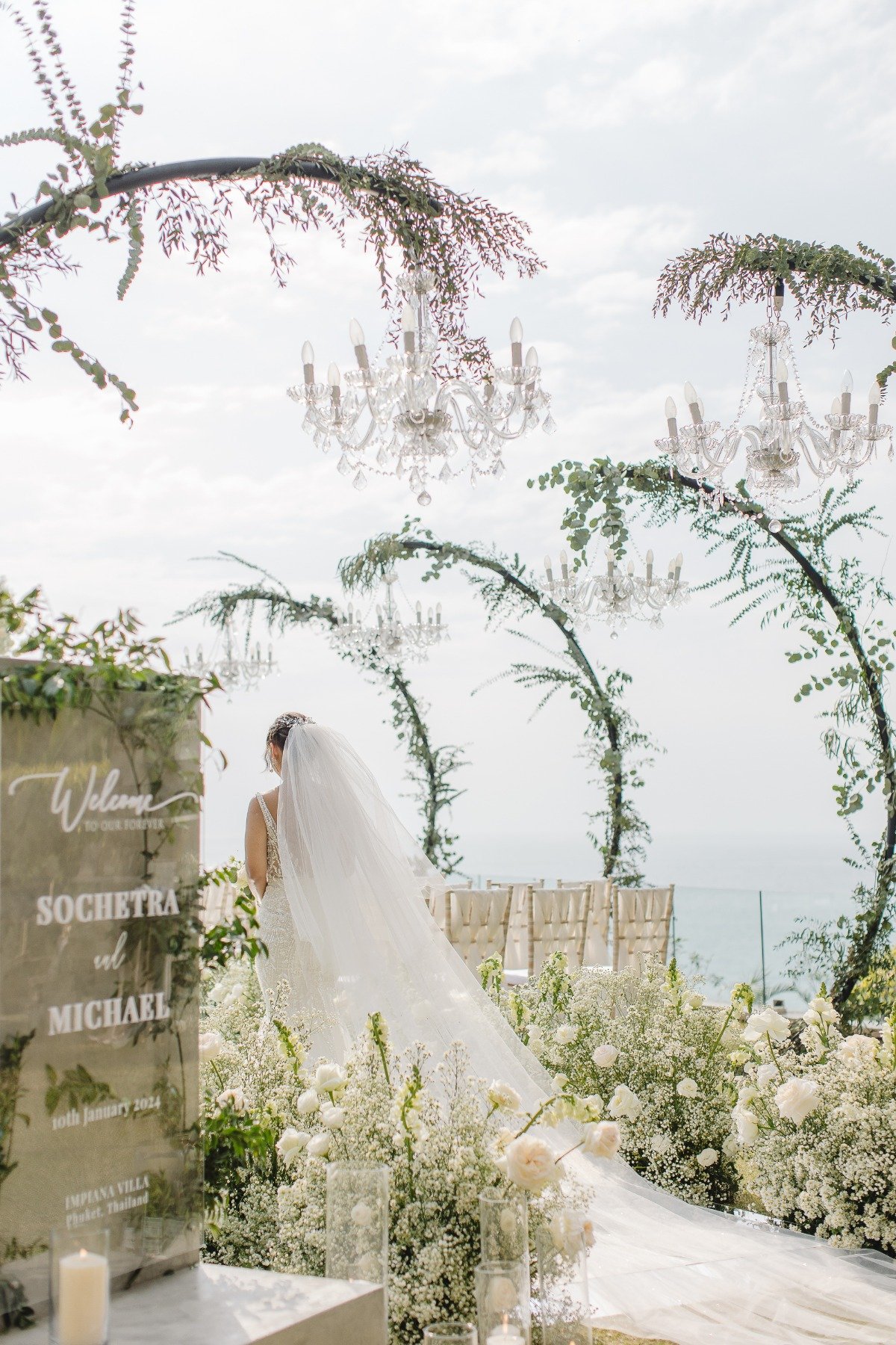 white rose baby's breath and votive aisle runners