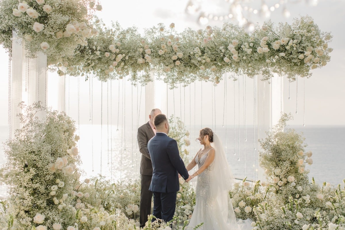 floating floral arch with hanging crystals