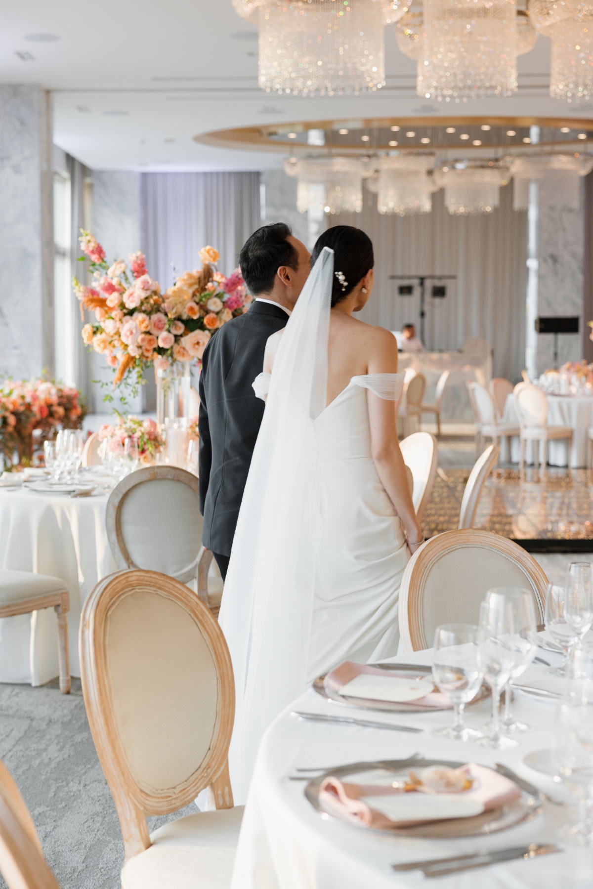 bride and groom at indoor wedding reception in cancun