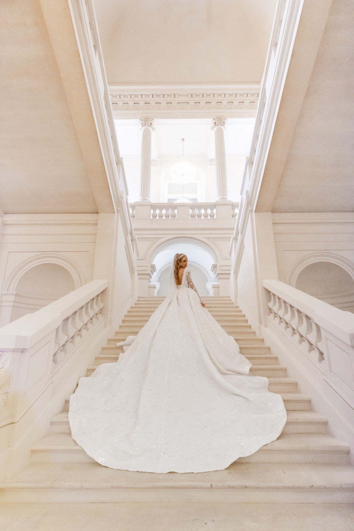 white ballgown wedding dress with long train