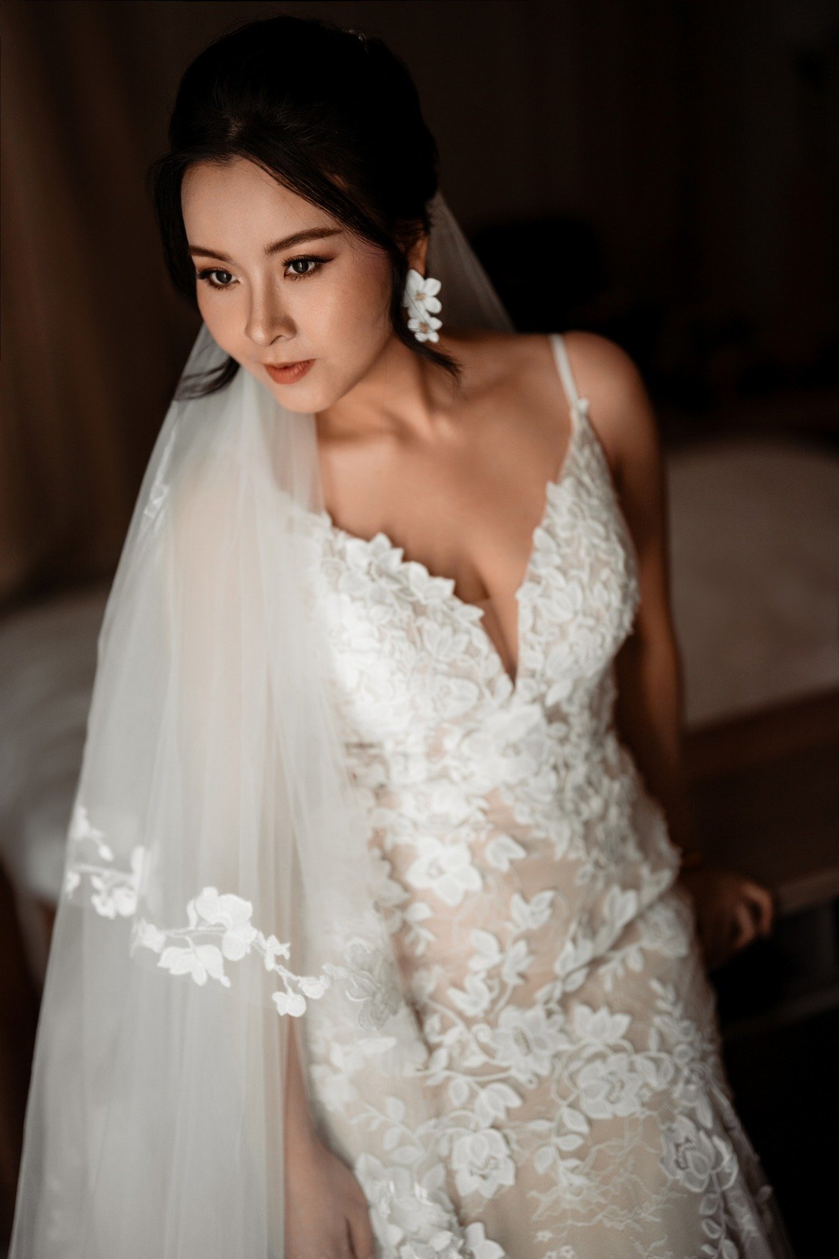 white lace mermaid gown for wedding with flower earrings