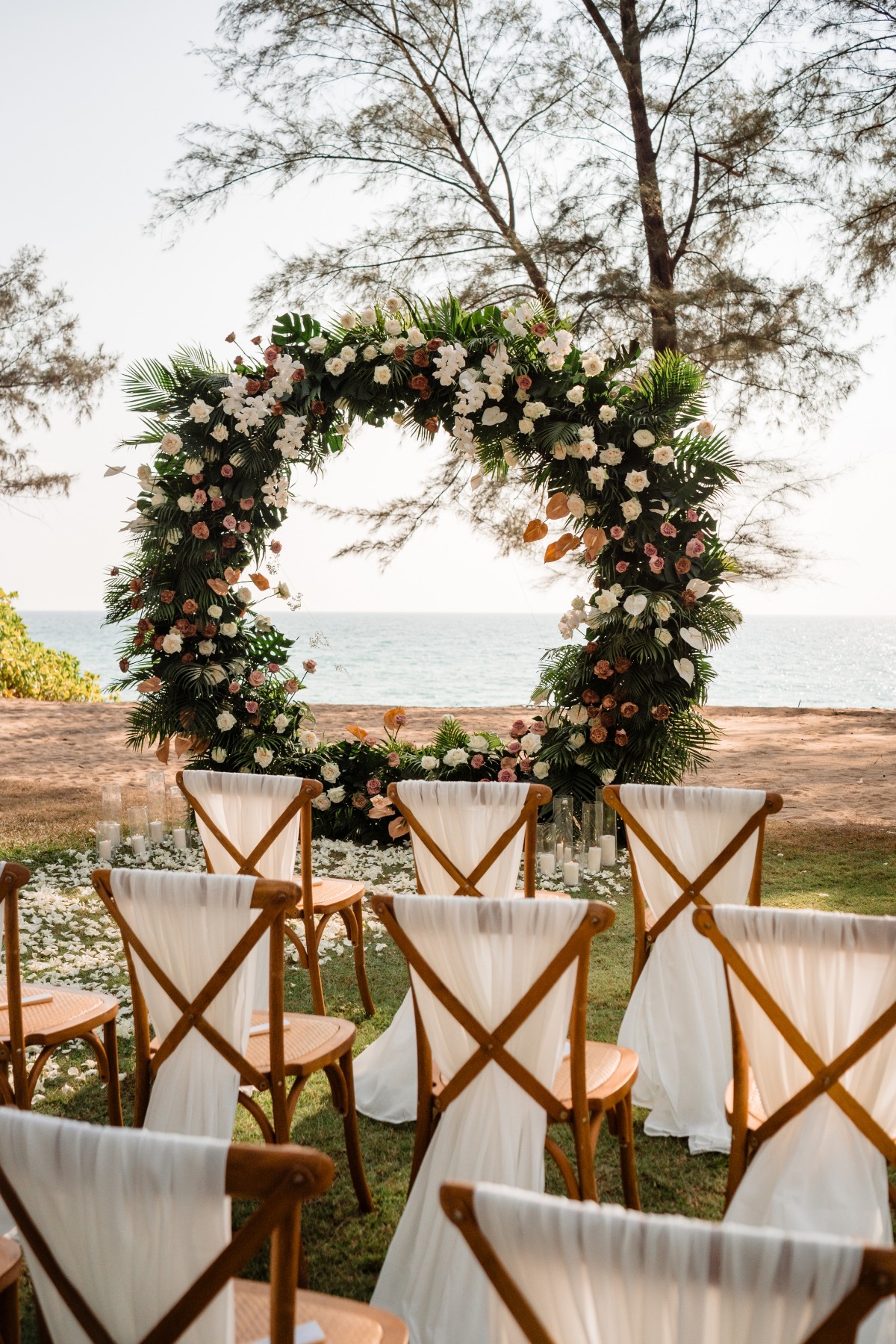 circle wedding flower arbor with white and terracota flowers