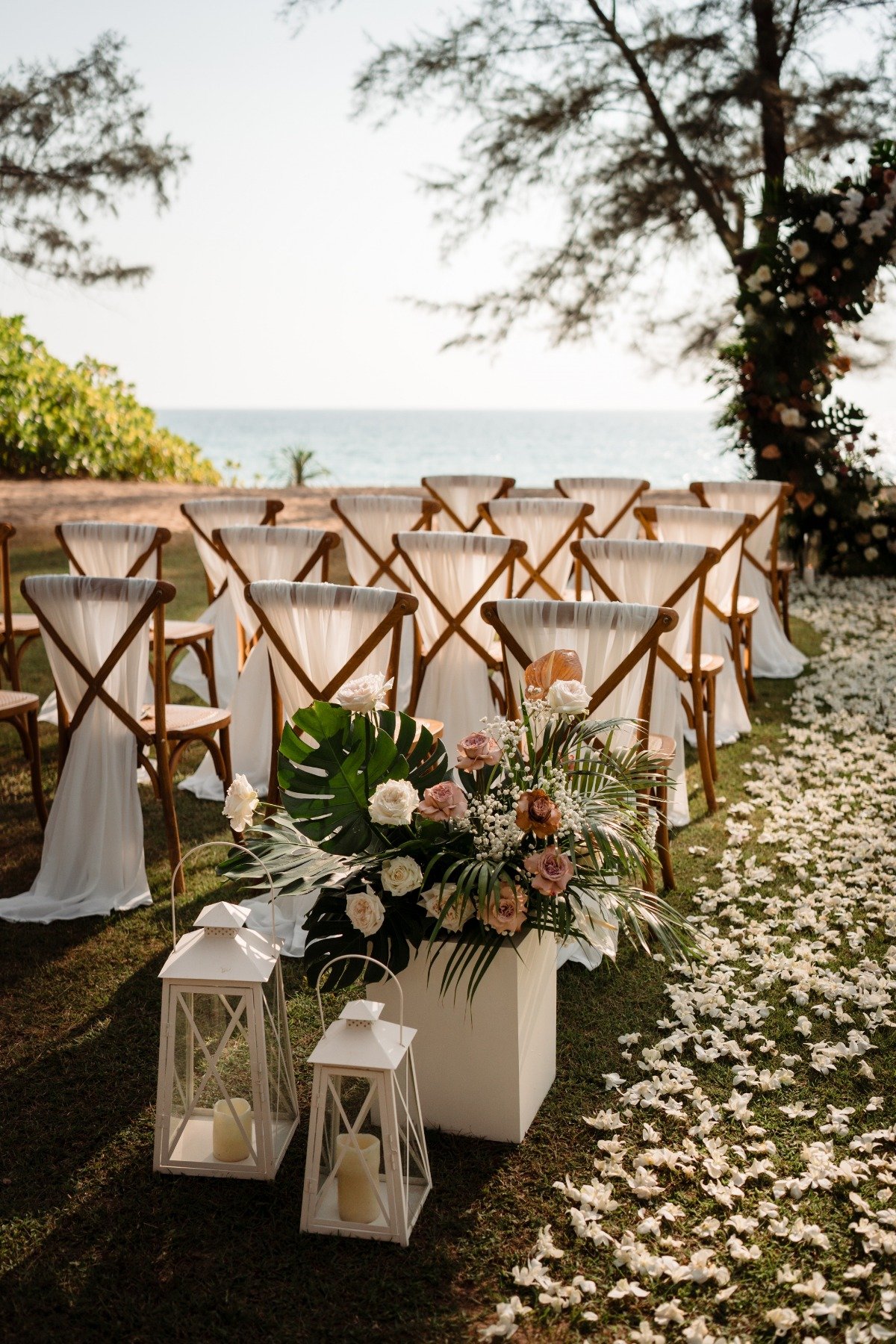 fabric on chairs at outdoor wedding ceremony