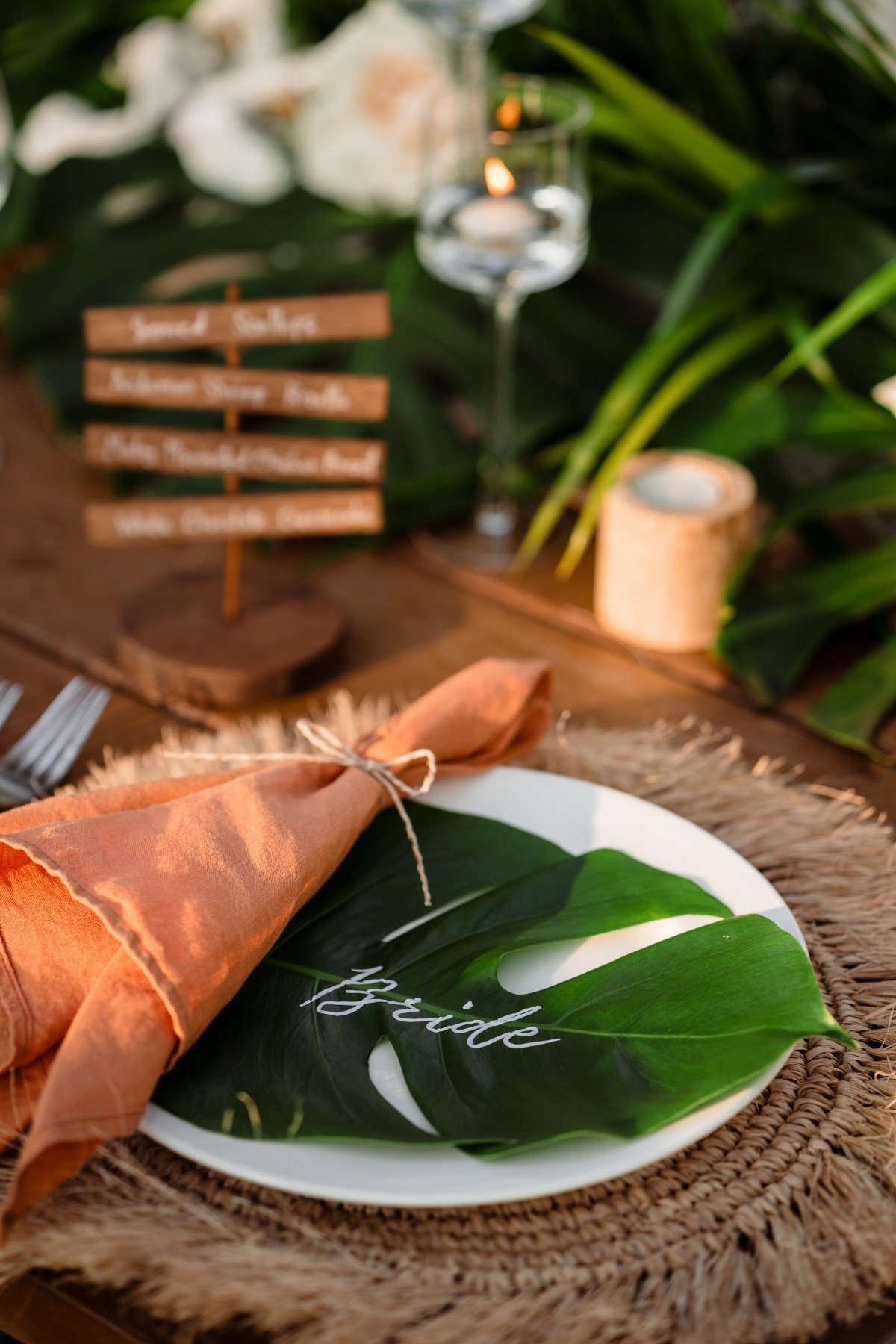 monstera leaf escort cards for tropical wedding