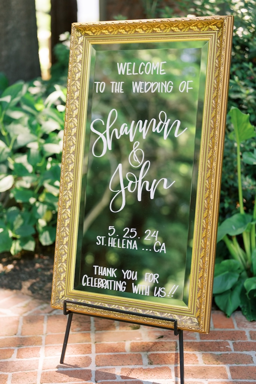 mirrored wedding welcome sign with calligraphy