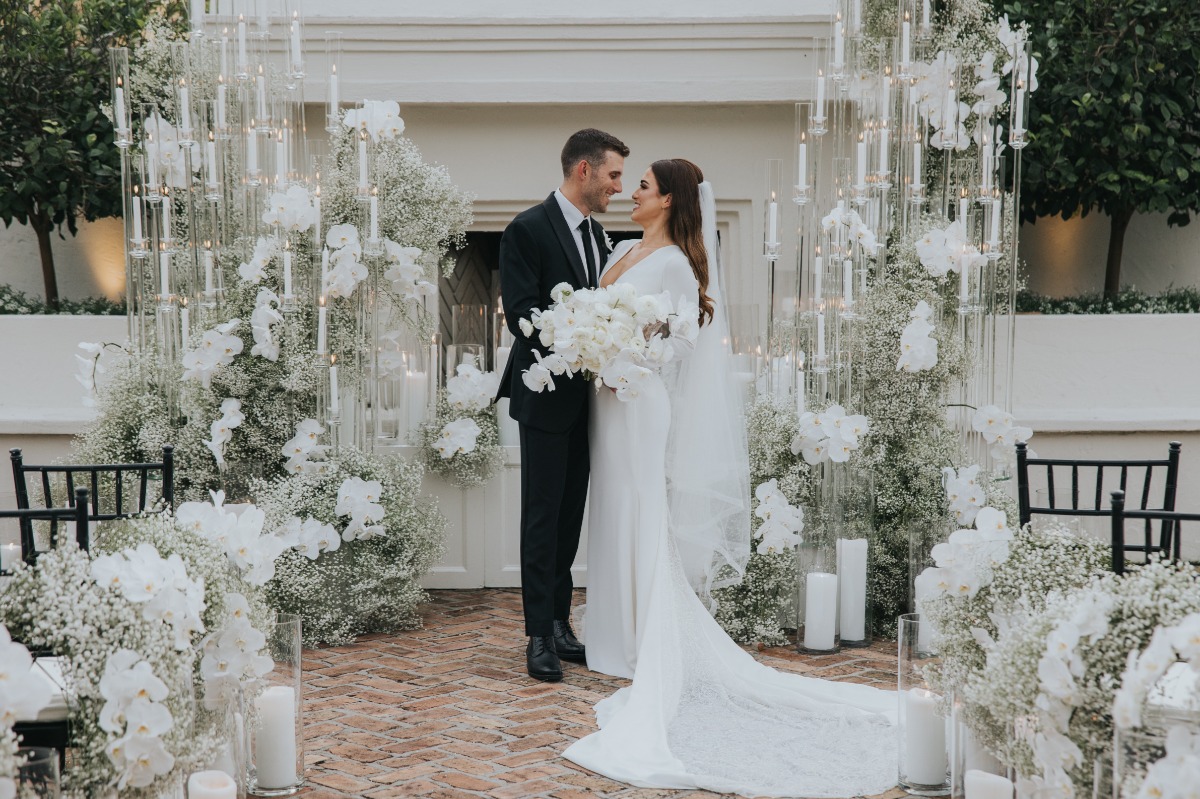 bride and groom at candlelit courtyard wedding in new orleans