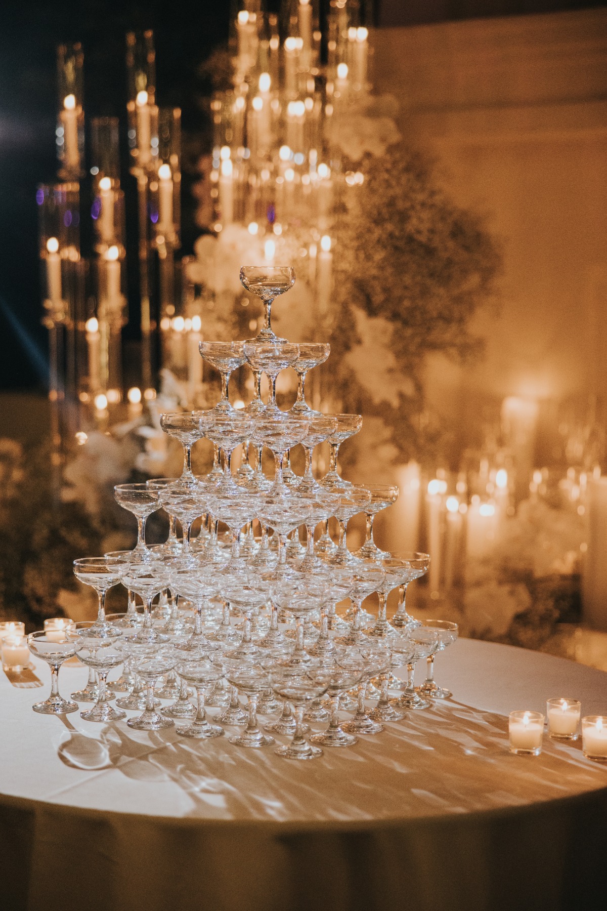 champagne tower with candlelight