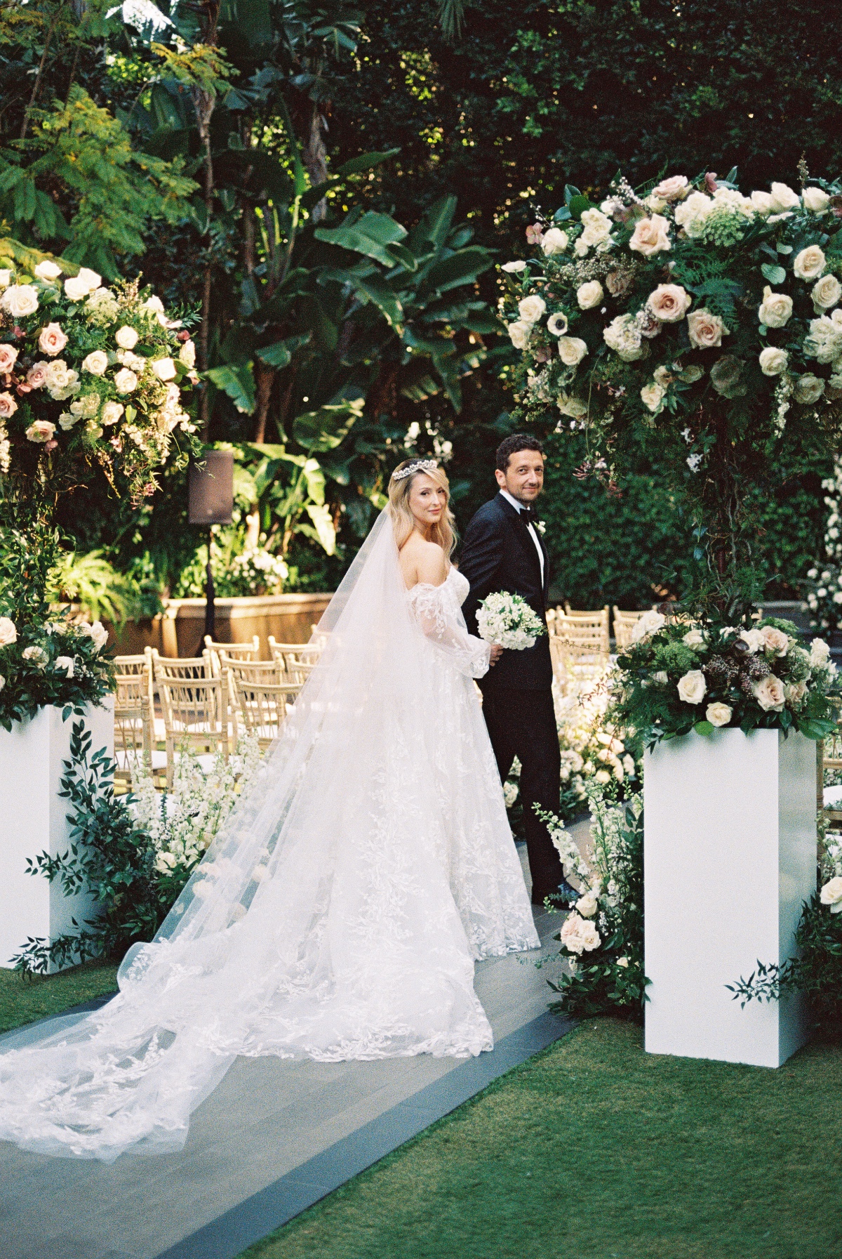 bride and groom at garden ceremony at the four seasons la