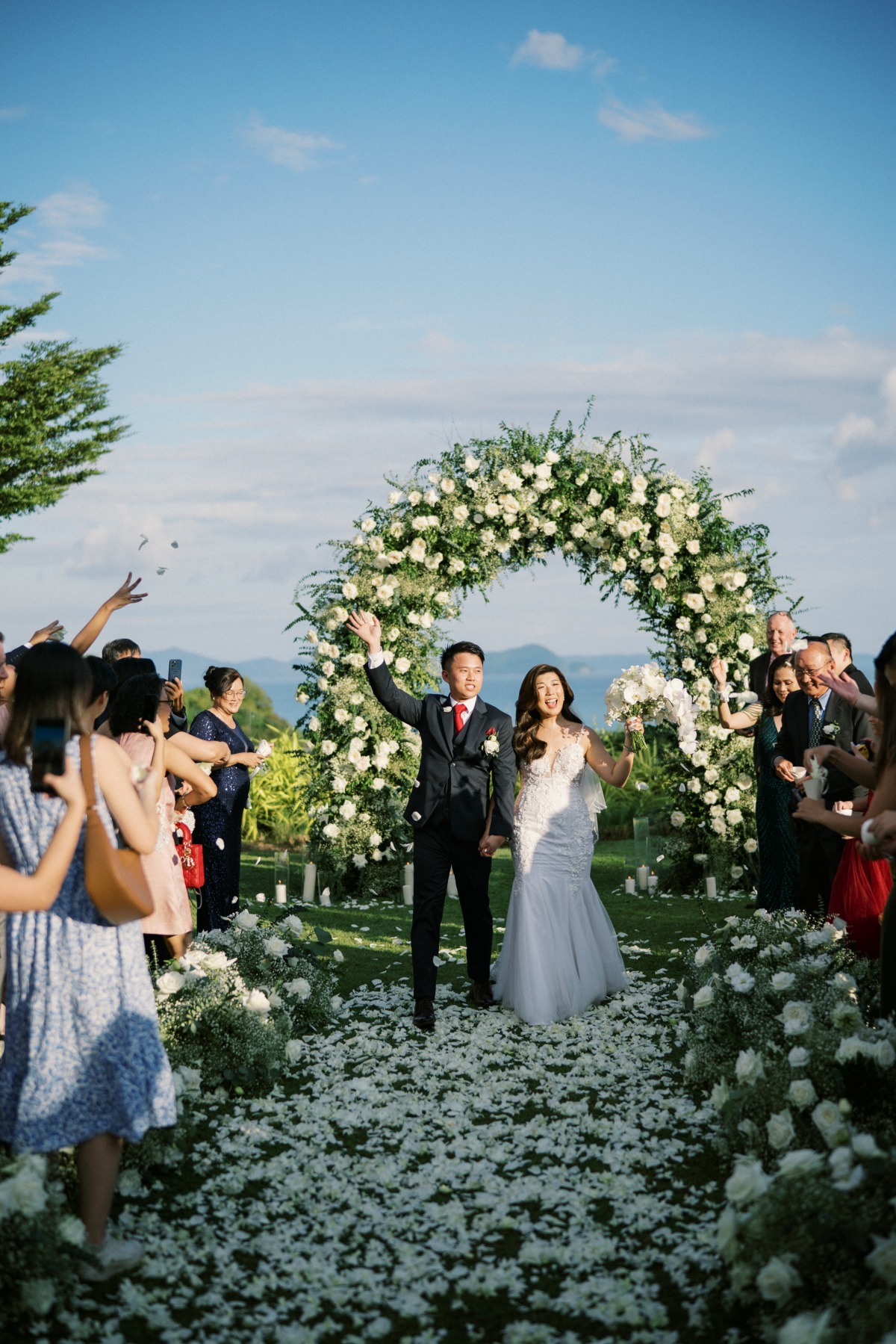 bride and groom at outdoor wedding ceremony in thailand