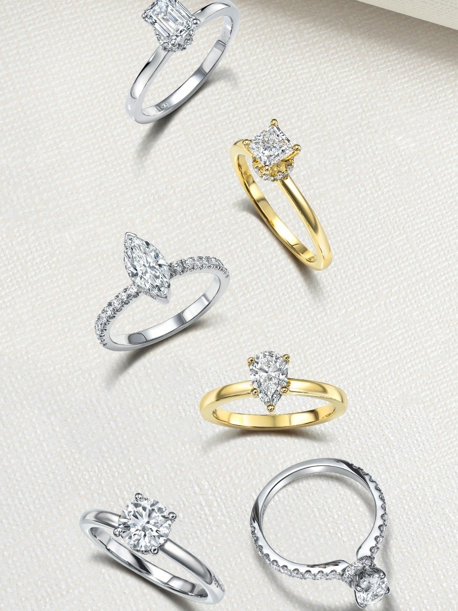 hidden halo engagement rings from diamond wish