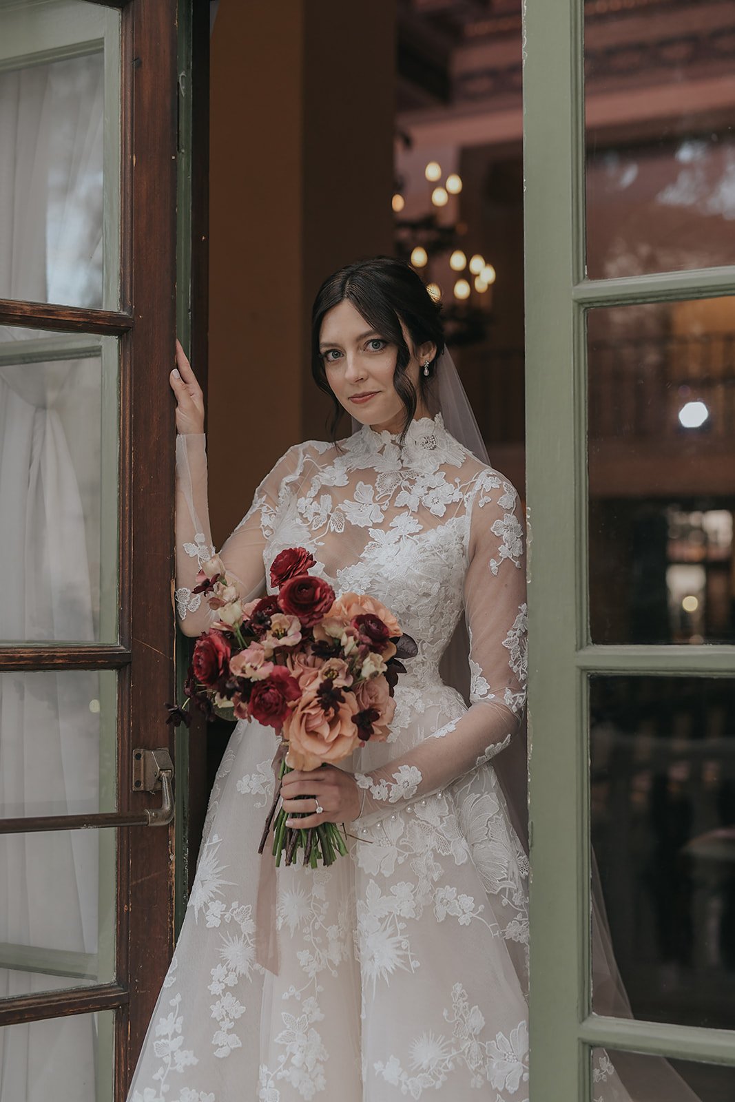 bride in custom monique lhuillier wedding dress