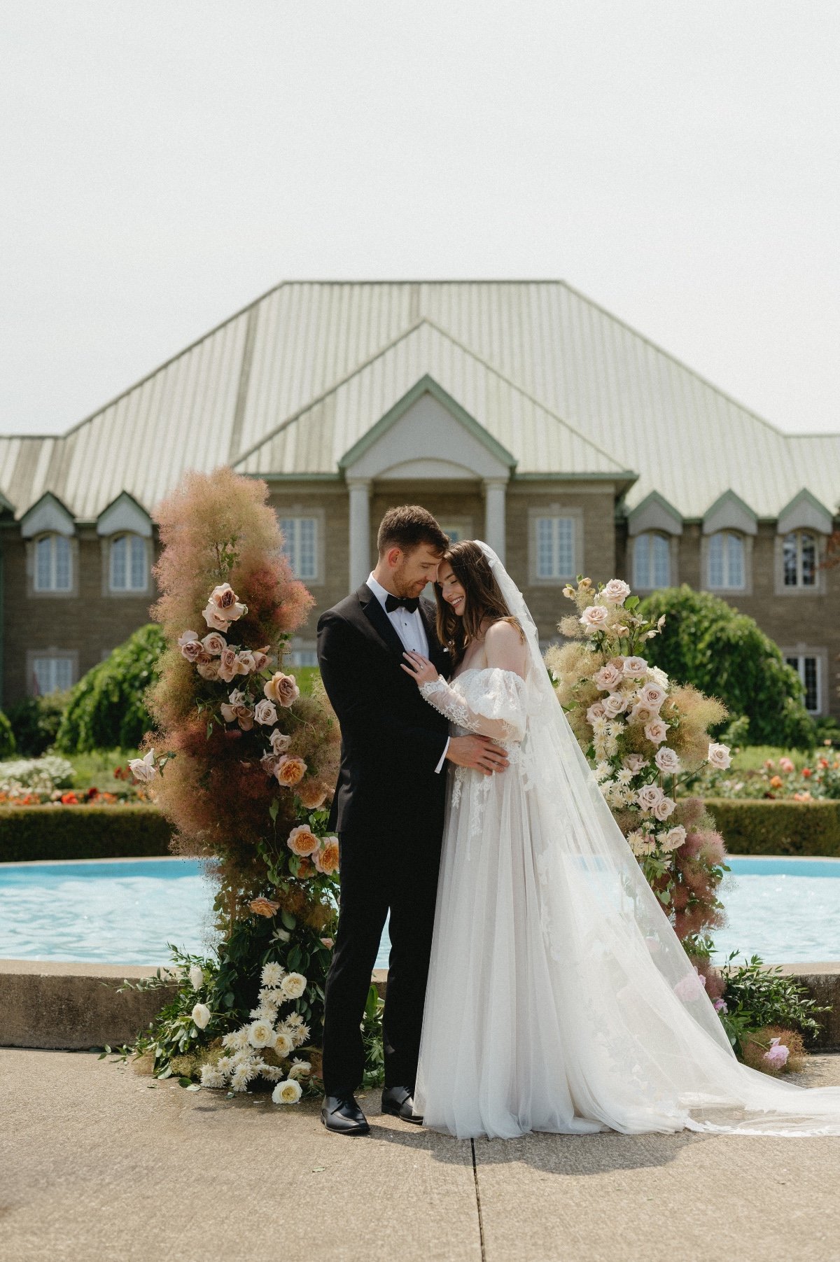 floral columns with dried flowers and roses