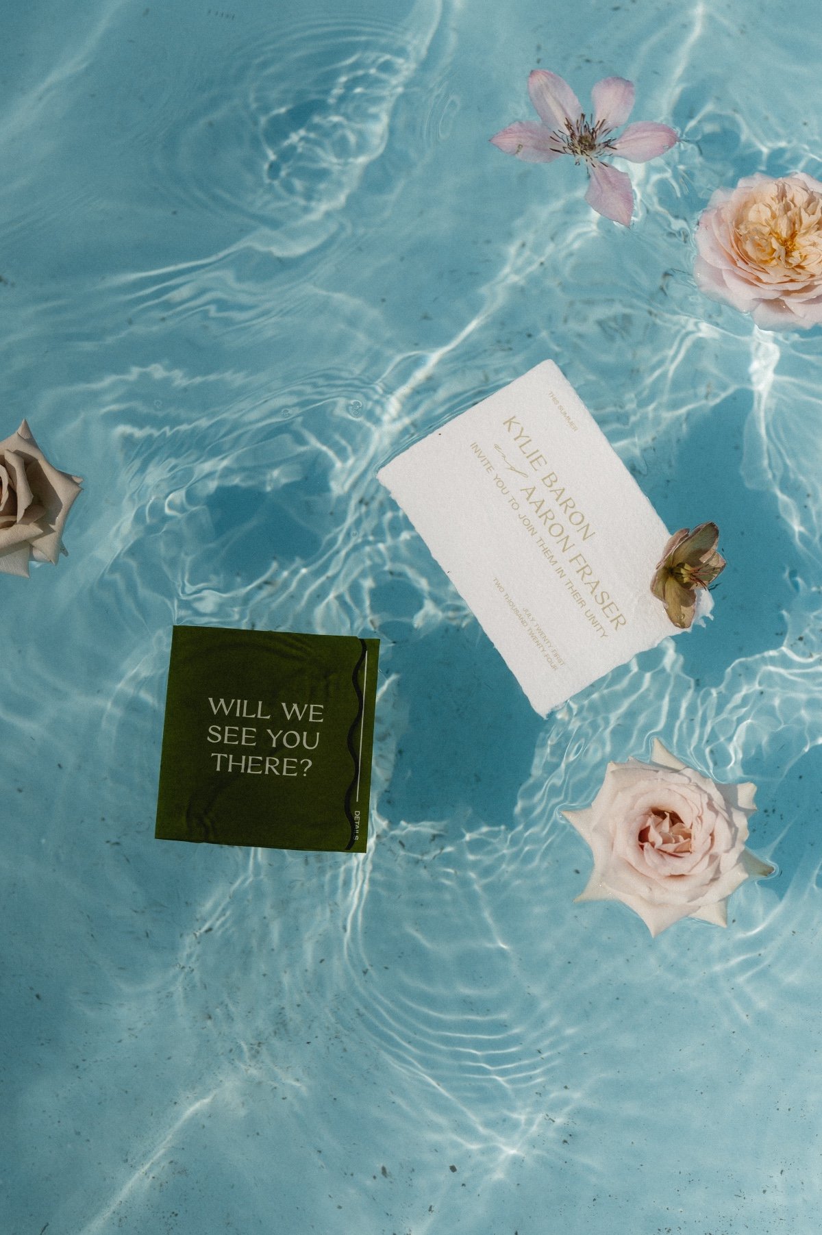 floating invitation suite flat lay