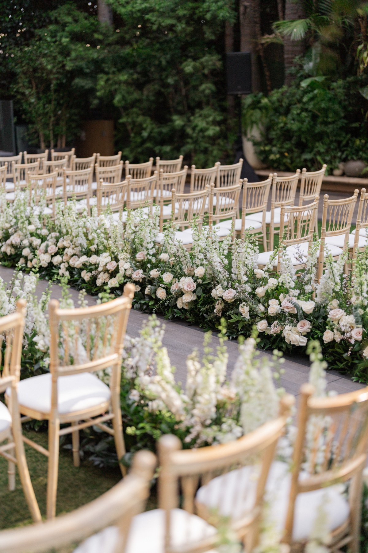 blush and ivory flowers for wedding ceremony aisle