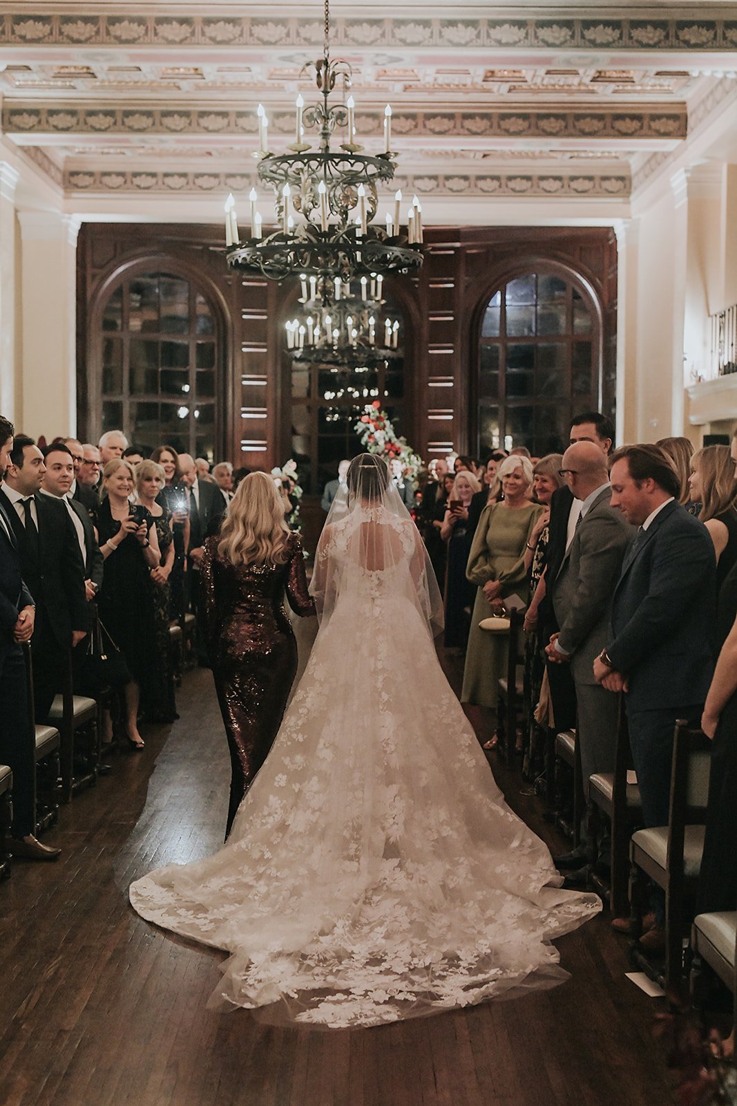 mother walking bride down the aisle