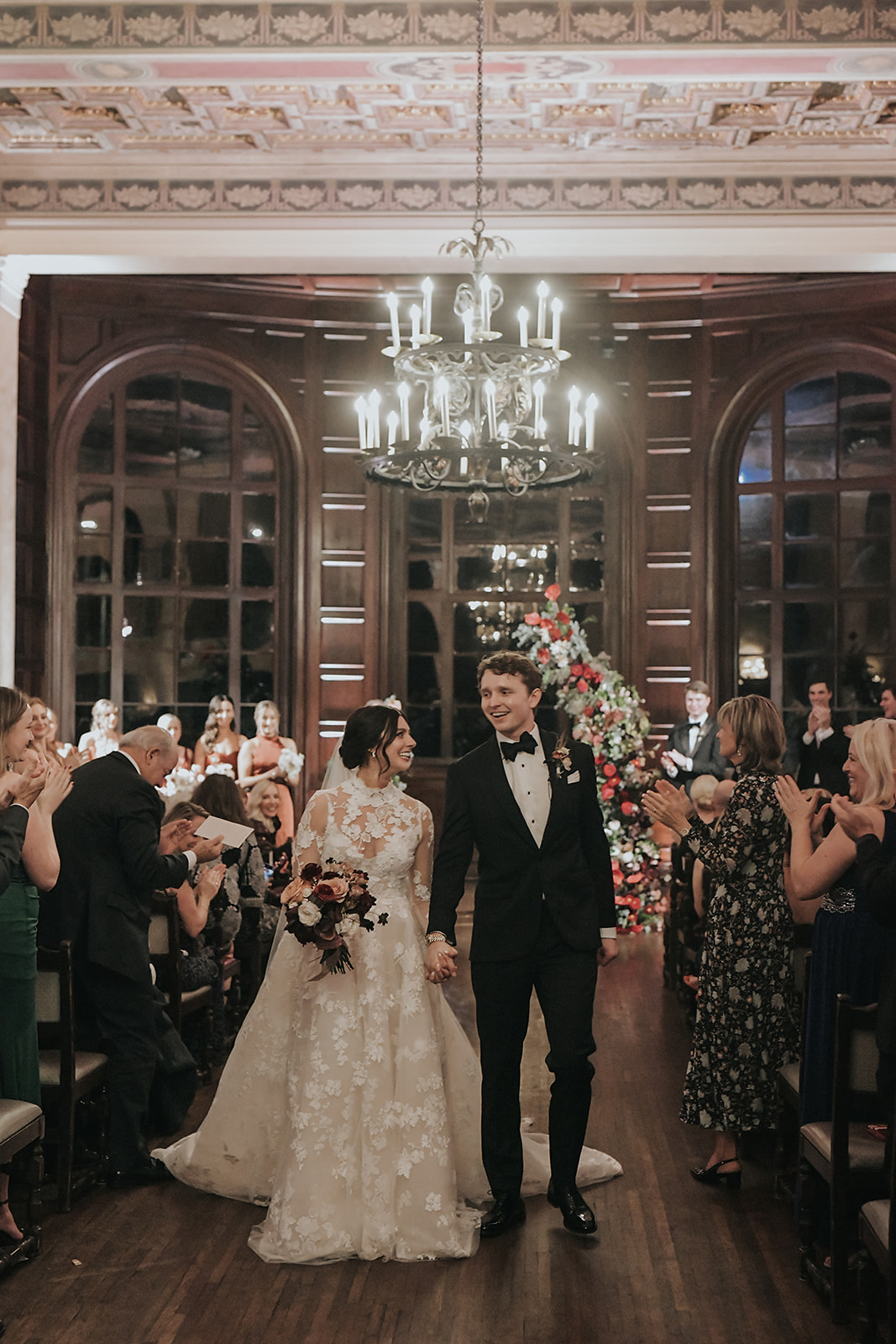 bride and groom at indoor vintage wedding ceremony