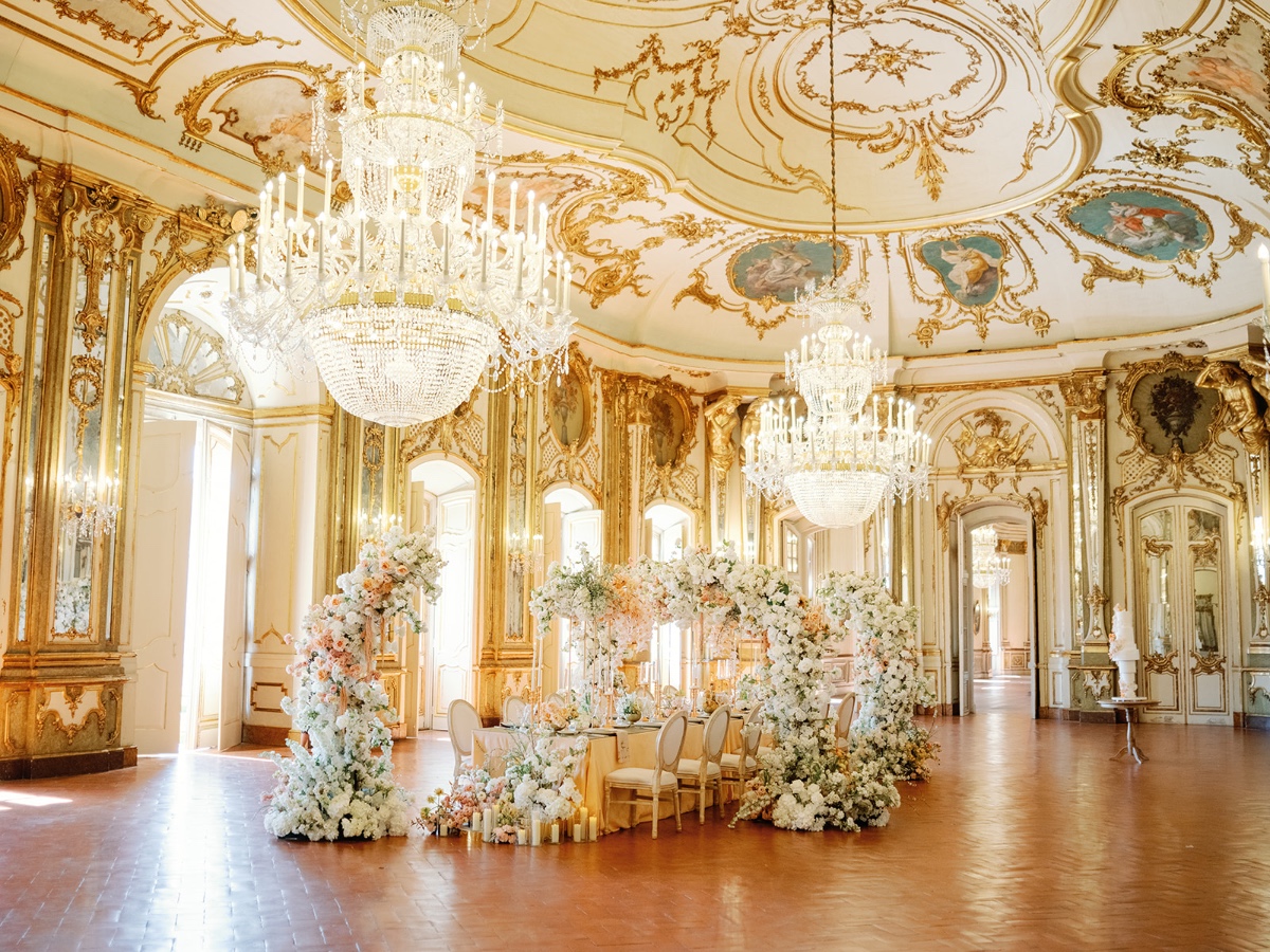 peach wedding in a gold ballroom