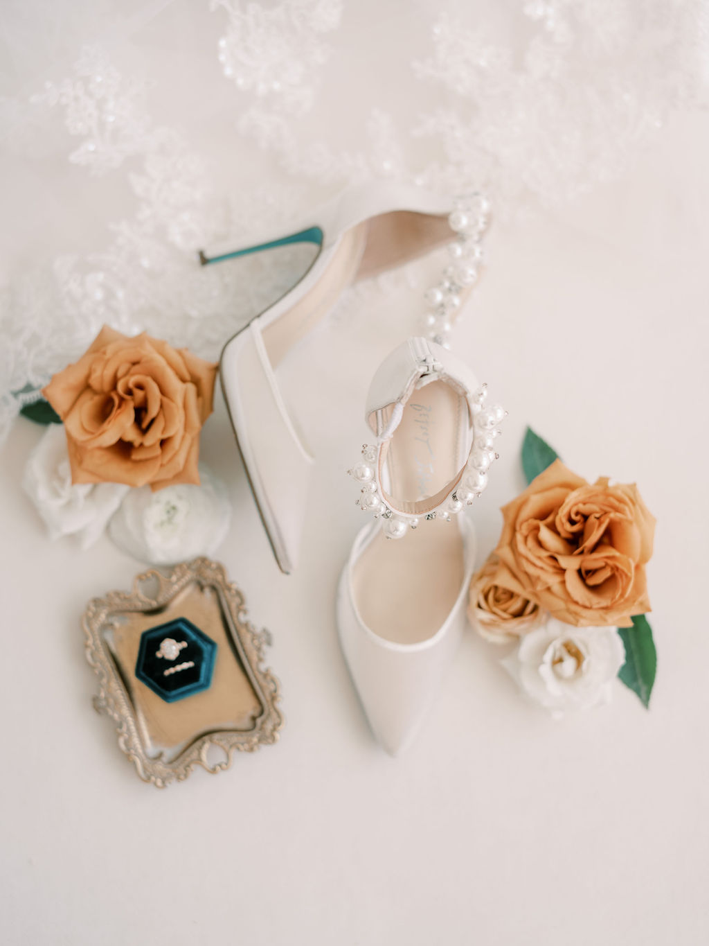 mesh wedding shoes with pearl details and blue bottom