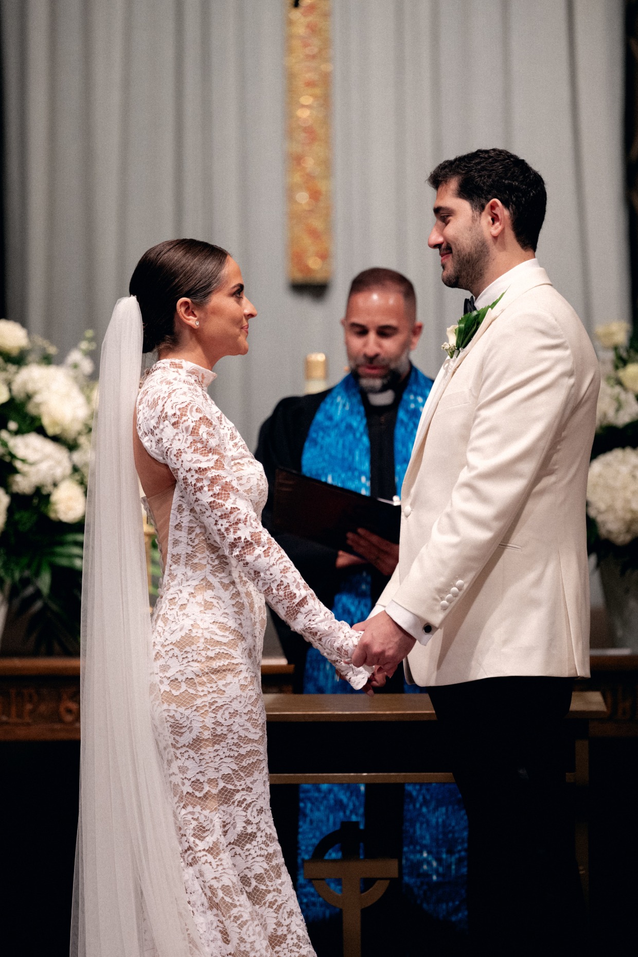 wedding ceremony with bride in long sleeve galia lahav wedding gown