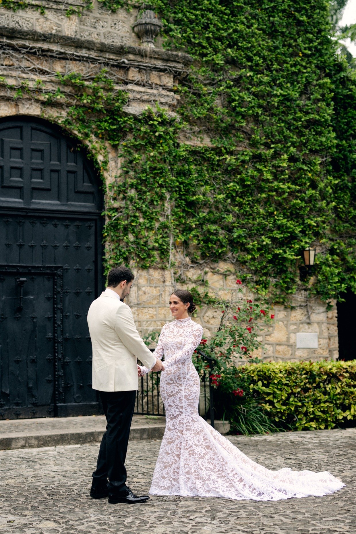 bride in long sleeve lace galia lahav wedding gown