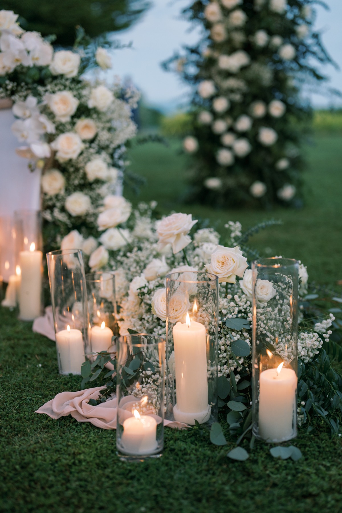 candlelight baby's breath and white roses