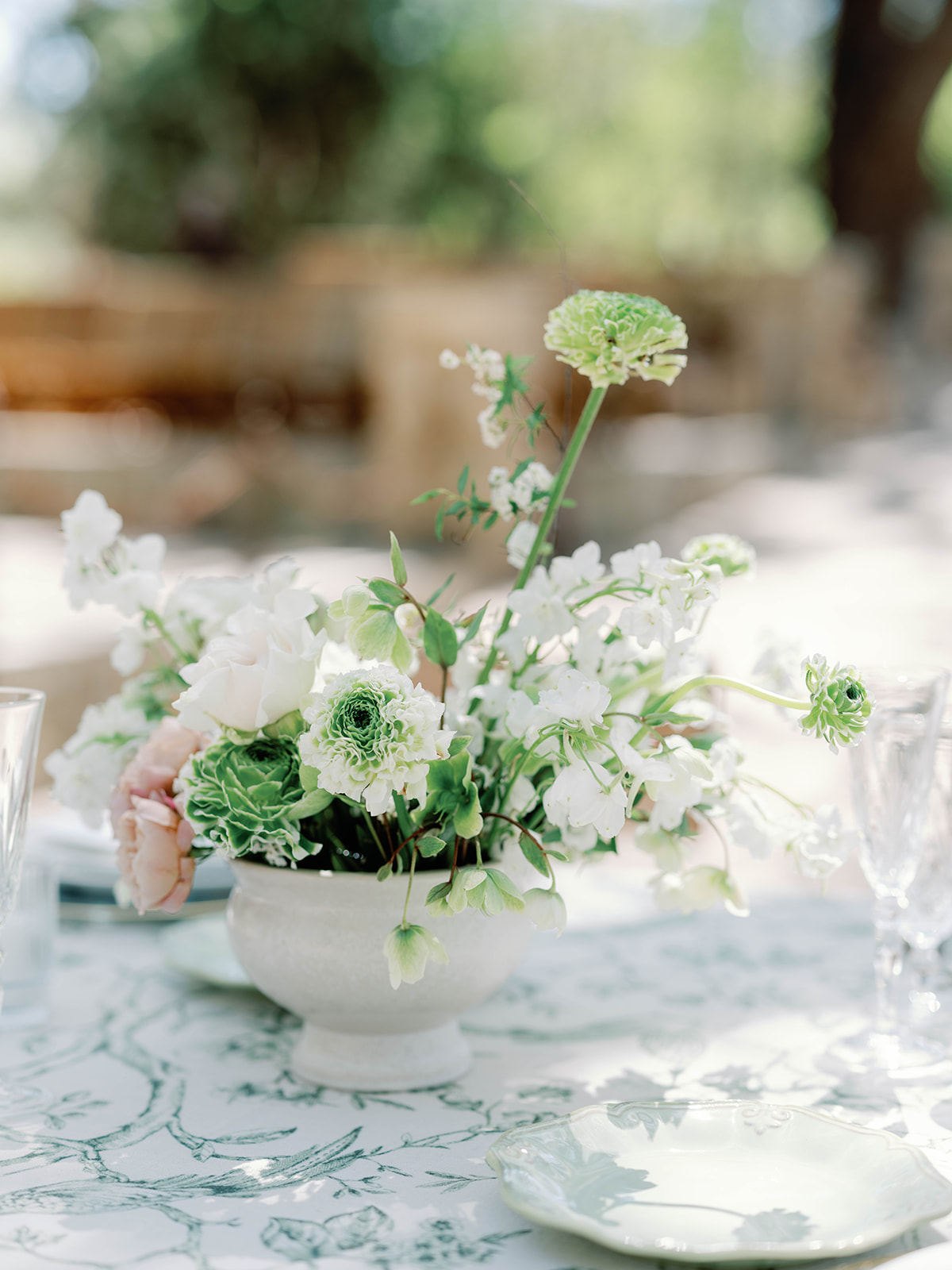 whimsical ivory wedding reception floral centerpiece