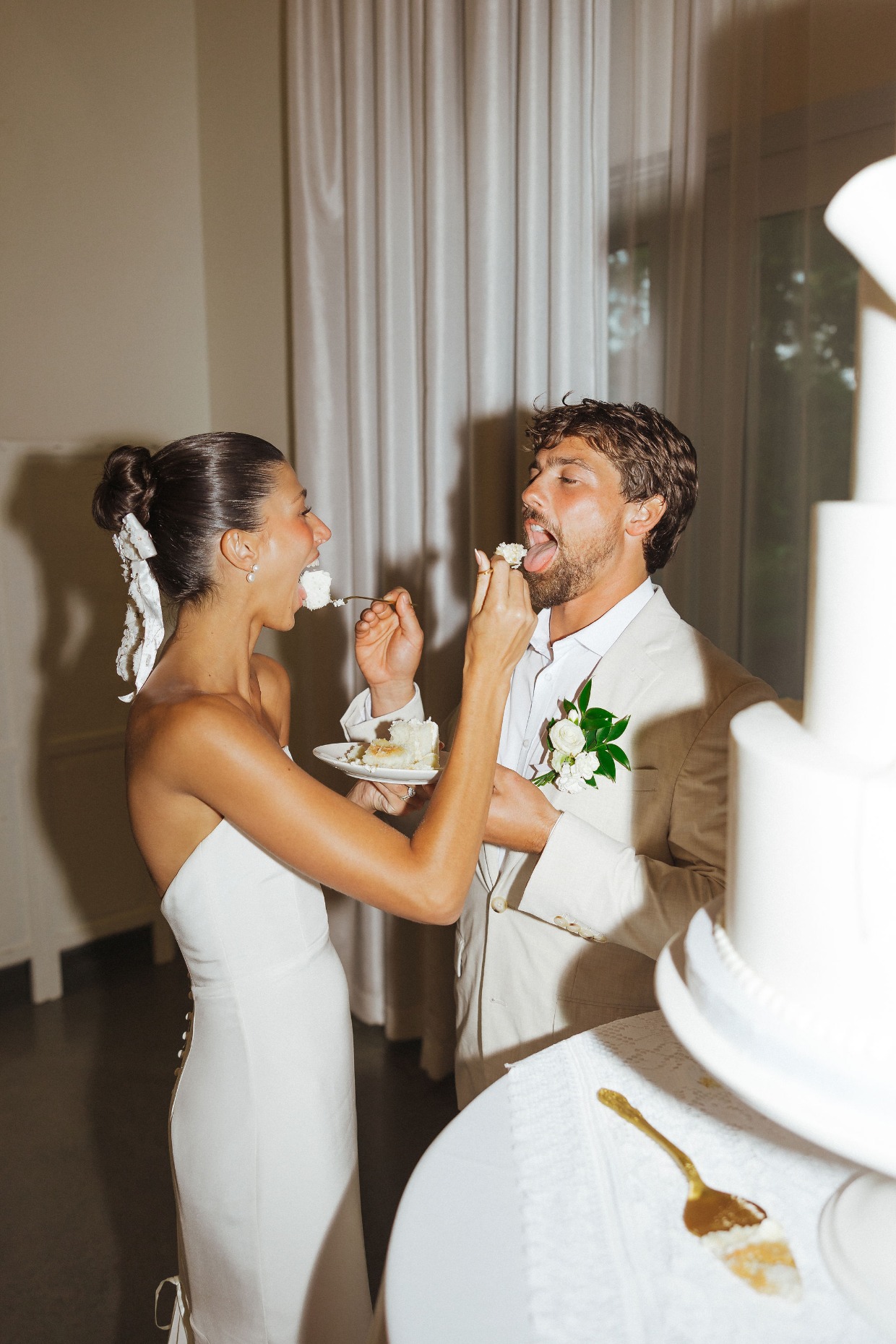 cake cutting at wedding by with great love